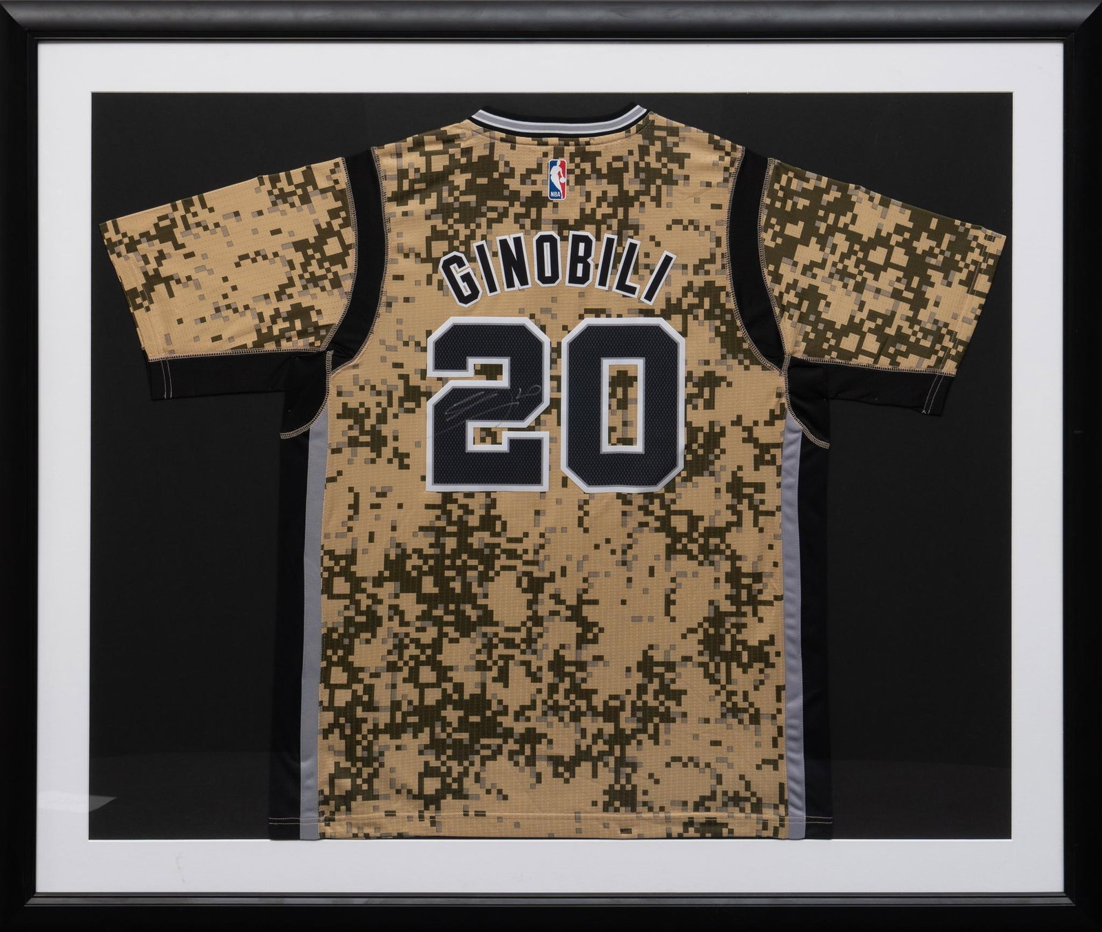 Manu Ginobli, Signed San Antonio Spurs Jersey: Manu Ginobili signed San Antonio Spurs basketball team jersey, framed height 42 in. x width 50 in. Provenance: Property from the estate of a Vero Beach, Florida lady Shipping available for this lot th