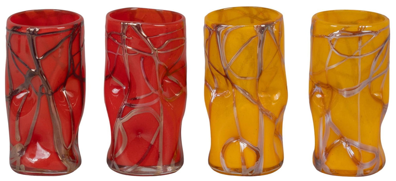 Garcia Art Glass, (4) Highball Glasses: Garcia Art Glass (San Antonio, Texas), four highball glasses, with impressed accents, signed on base, numbered 990, 998, 856, 855 height 6 in. x width 3 in. x depth 3 in. Provenance: Property from a S