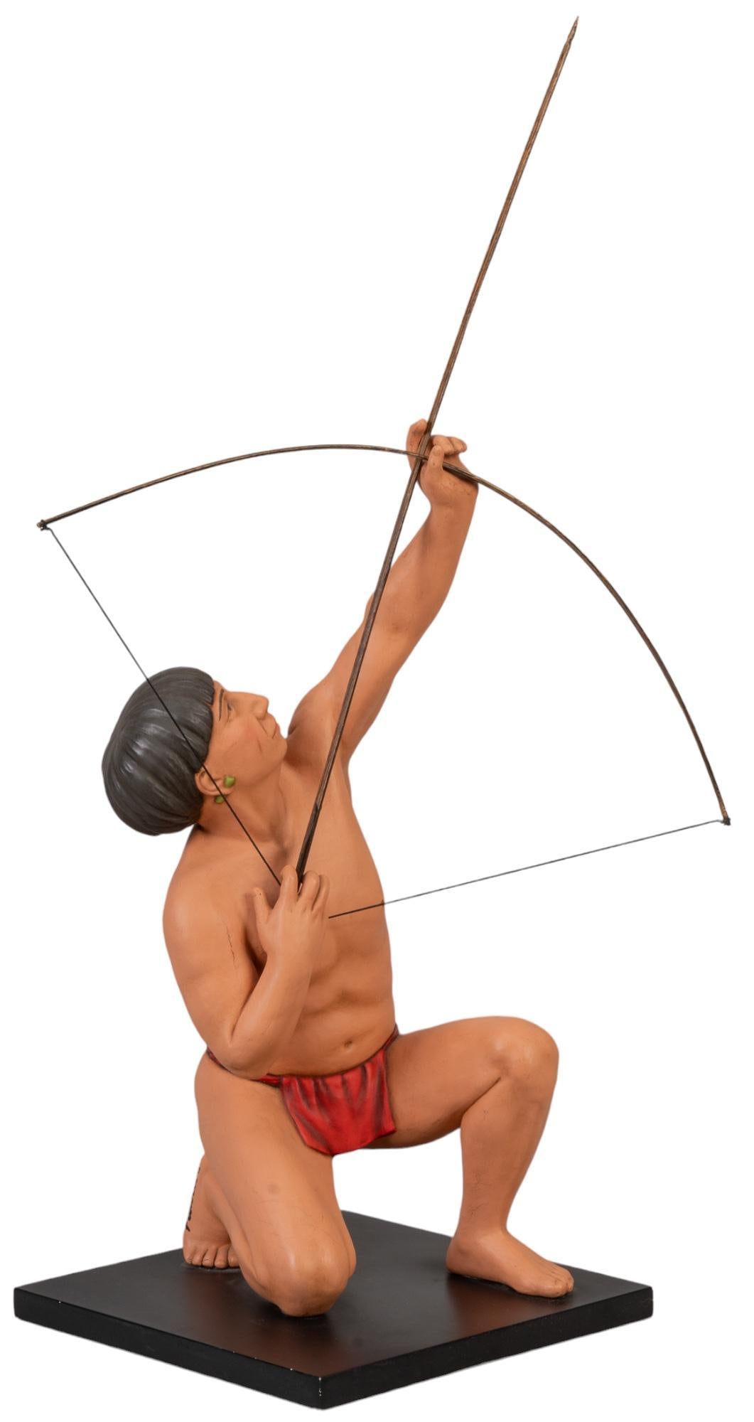 Ceramic Archer Sculpture: Ceramic archer sculpture, bow is seperate piece, mounted on stand, signed by artist (illegible) height 28 in. x width 10 in. x depth 10 in. Provenance: Property from a San Antonio, Texas gentleman Shi