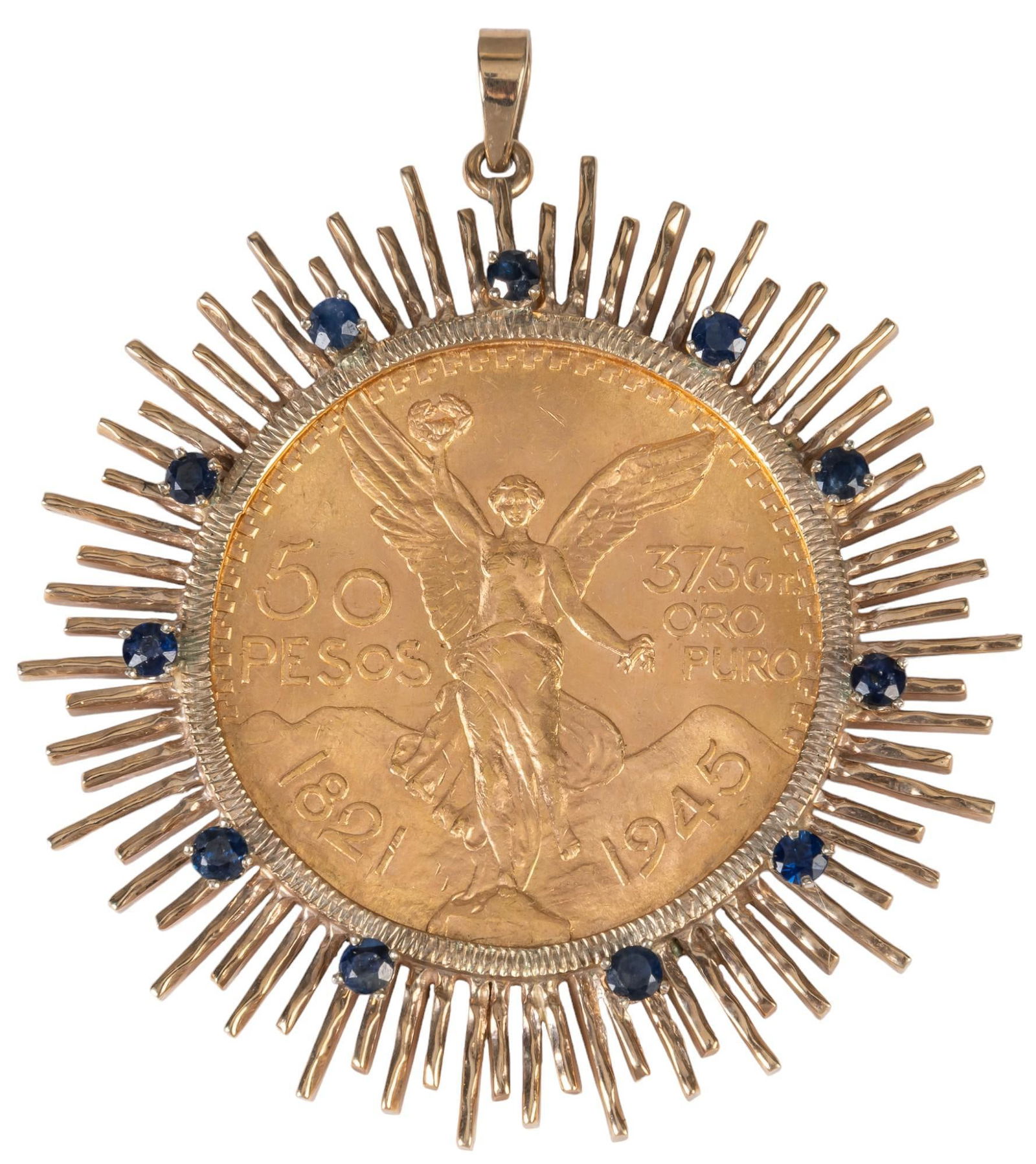 Mexican 50 Peso Coin With Gold & Sapphire Bezel: Cincuenta Peso Gold Coin (1945) in an 14k gold bezel, with eleven inlaid sapphires Circumference: 2.5 in. Weight: 60.0 g Provenance: Property from a San Antonio, Texas collection Shipping availabl