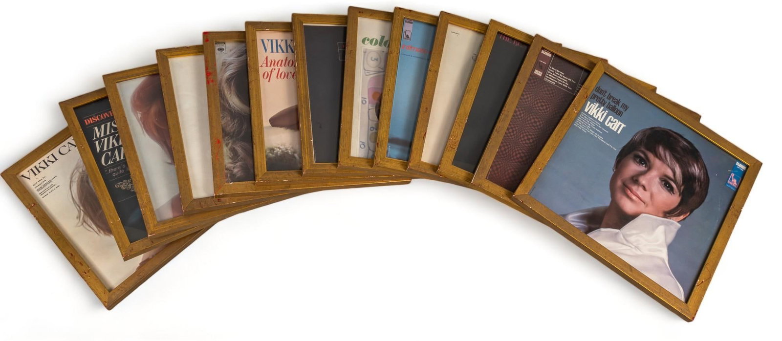 Vikki Carr | Framed Album Covers: Collection of thirteen (13) album covers by Vikki Carr, all presented in matching frames, includes Certificate of Authenticity as from The Collection of Vikki Carr height 13.5 in. x width 13.5 in. / e