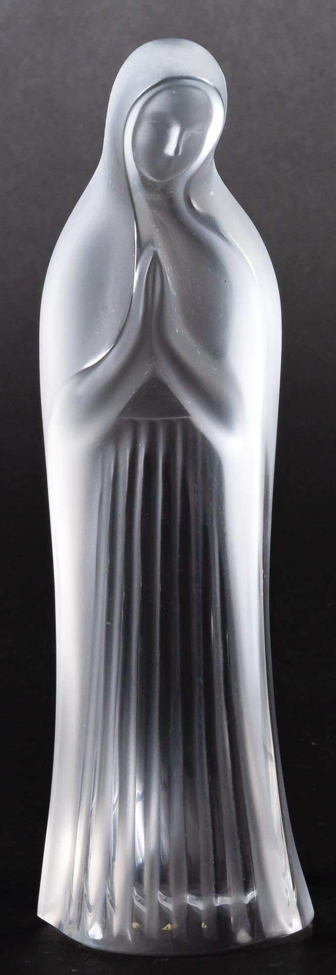 Vikki Carr | Lalique Virgin Mary Crystal Figurine: Lalique (France) frosted crystal figurine depicting the Virgin Mary Madonna with head bowed in prayer, etched "Lalique France" on bottom, includes Certificate of Authenticity as from The Colle