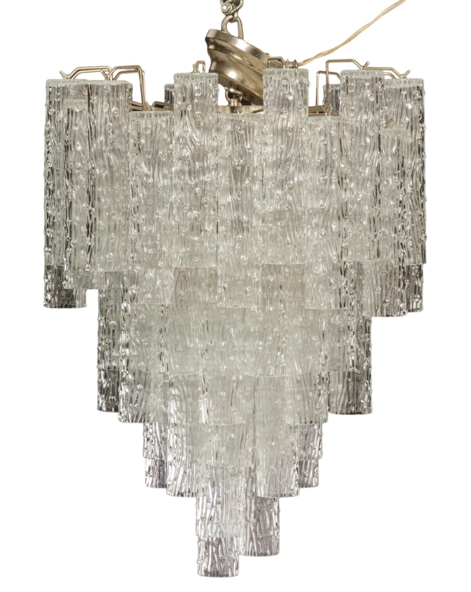 Mid-Century Chandlier: Mid-century chandelier, featuring tooled acrylic tubular shades height 28 in. x width 20 in. x depth 20 in. Provenance: Property from the collection of a Kerrville, Texas lady Shipping available for t