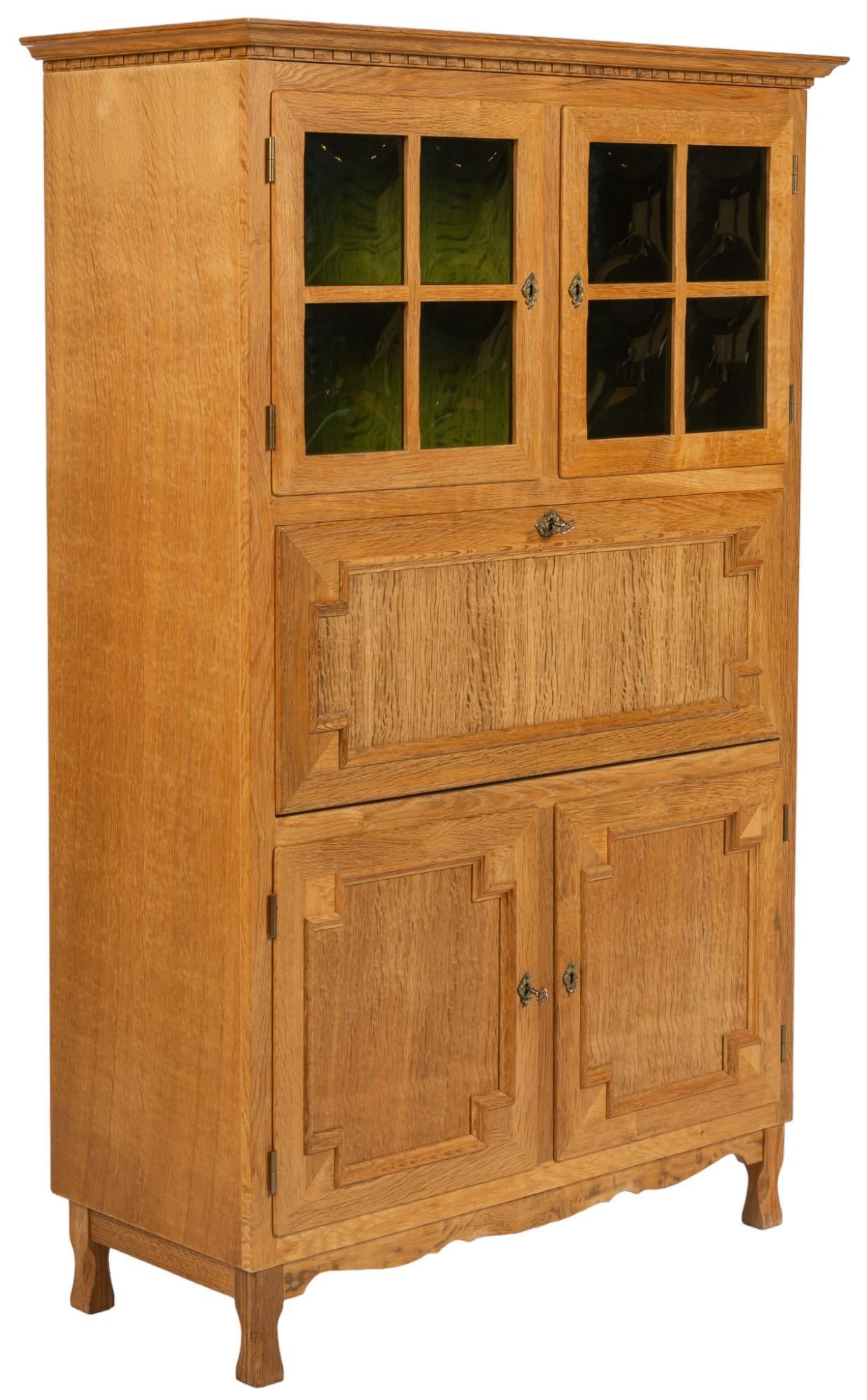Danish Mid-Century Cabinet: Danish mid-century cabinet featuring plastic green window pane storage unit with two interior shelves, one central cabinet, two lower doors with interior storage space, each section of doors locks, co