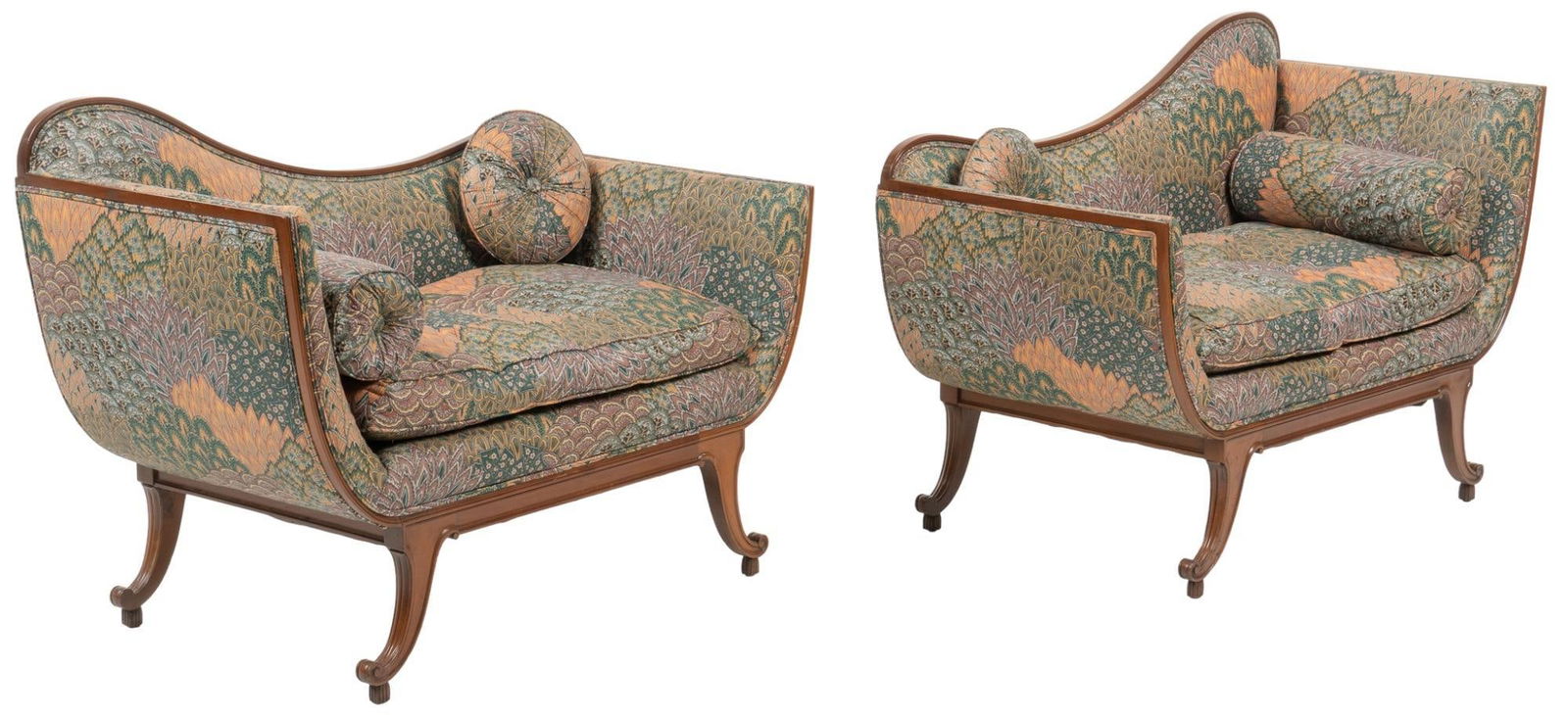 Pair of French Settees: Pair of French Meridienne style sofas / settees, featuring upholstery with colorful floral-inspired pattern, sloping back, supported on scrolled legs, with accent pillows height 35 in. x width 47 in.
