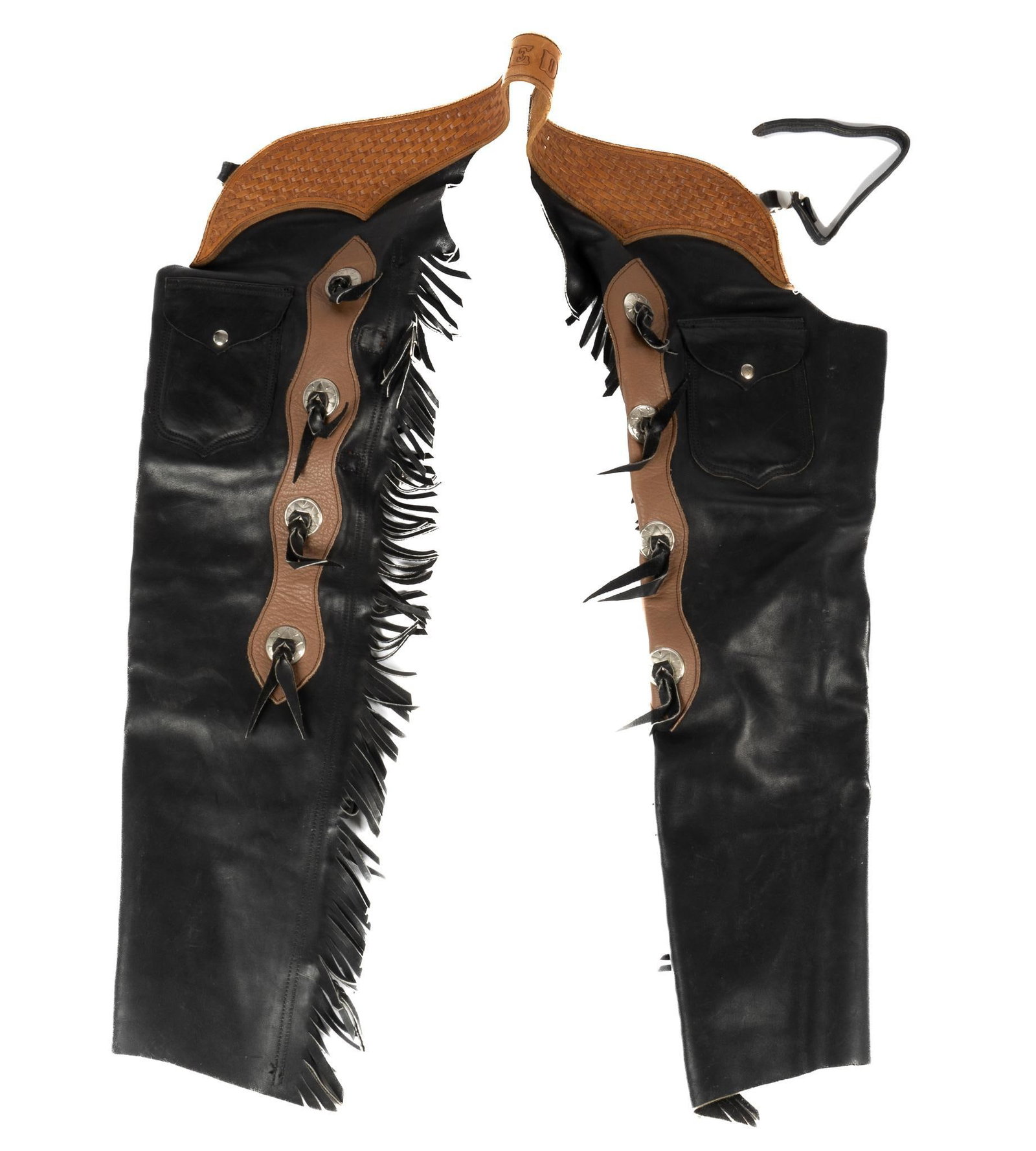Fringed Shotgun Cowboy Chaps: Fringed shotgun cowboy chaps with eight conchos and basket weave stamped belt, two pockets, zipper and buckle closures, belt stamped "E D" belt length 38 in. x pant length 40 in. Provenance: A