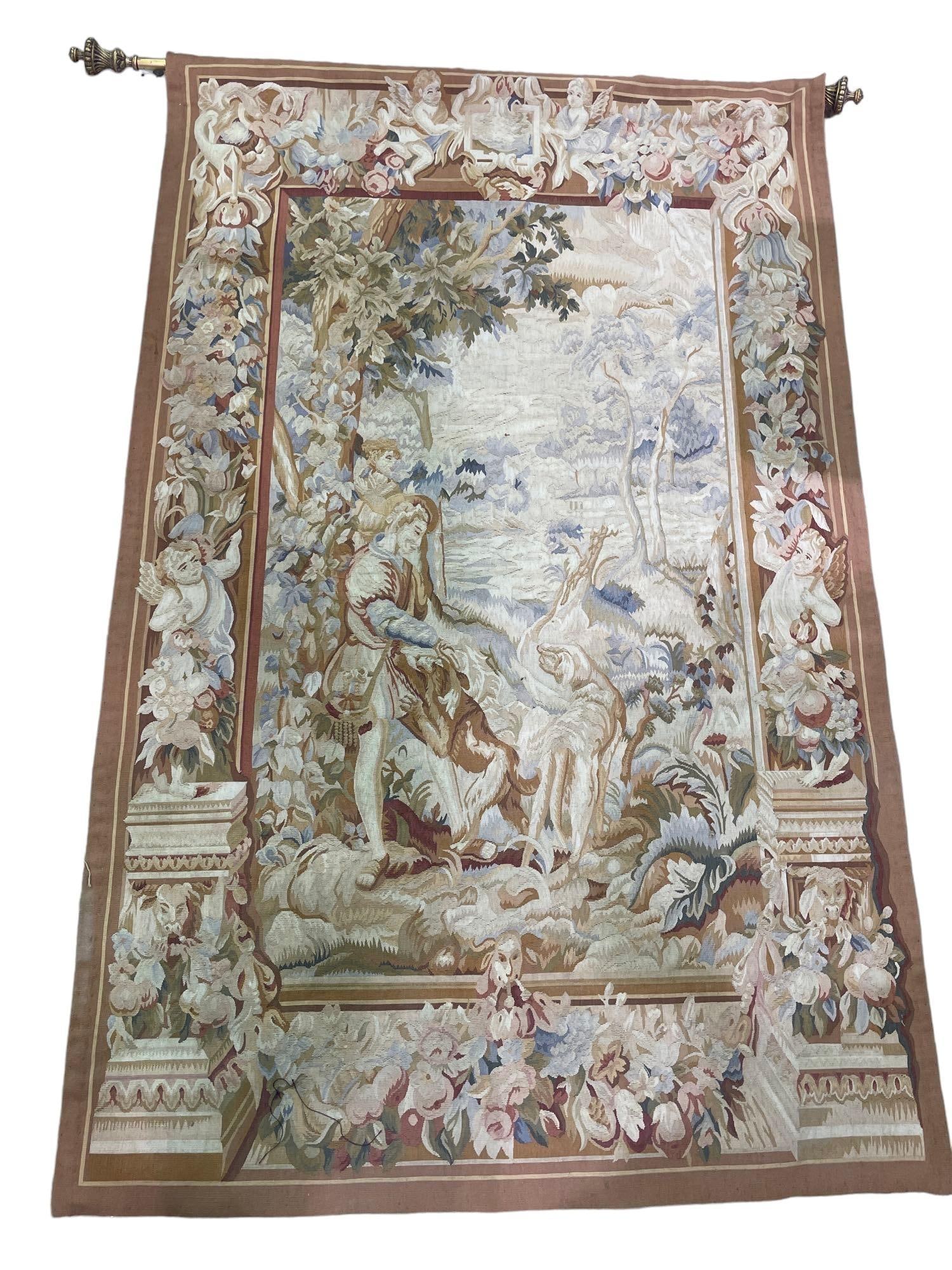 Tapestry on Rod: Woven tapestry featuring classical scene, with rod with tassel accents Shipping available for this lot through our partner 4CL; please request a shipping quote at shipping@vogtauction.com or 210-9