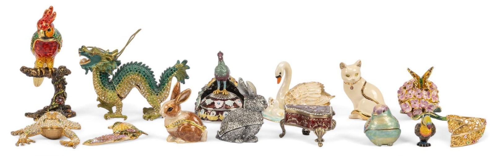 (14) Bejeweled Keepsake Boxes: Collection of bejeweled keepsake / pill boxes, featuring animal motifs height 4.5 in. x width 2 in. x depth 3.5 in. / largest Shipping available for this lot through our partner 4CL; please reques
