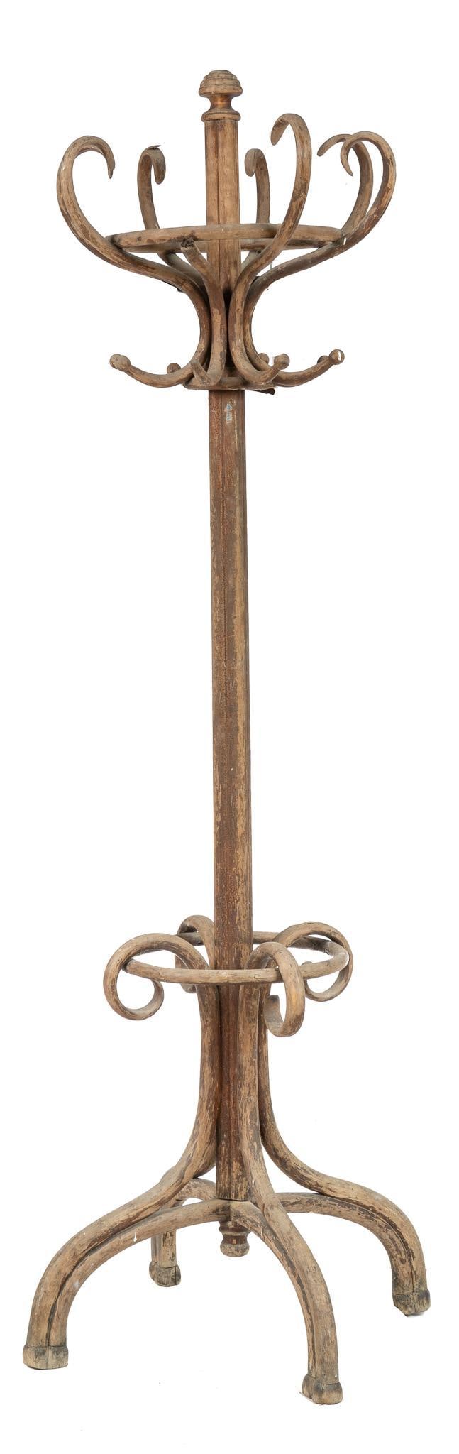 Coat Rack: Beech coat rack, with circularly arranged coat and hat hooks on top and umbrella rail at the bottom, supported on four arched legs 80"h x 28"w x 28"d We happily provide seamless shipping