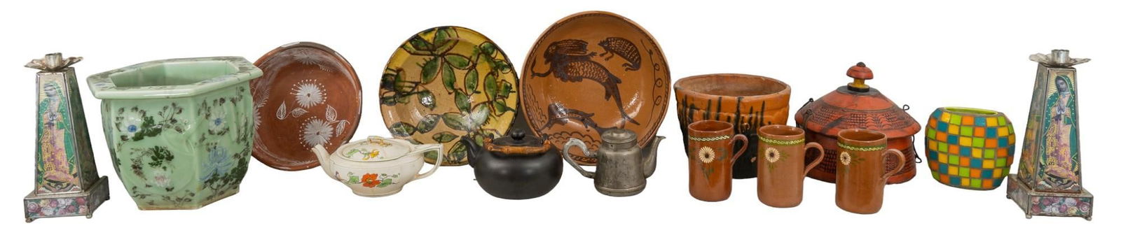Collection of Mexican Ceramics and Accents: Collection of Mexican ceramics and accents, includes bowls, mugs, plates, and tea pots, and pair of metal candlesticks, and one metal teapot height 9 in. x width 13 in. x depth 13 in. / largest Shi