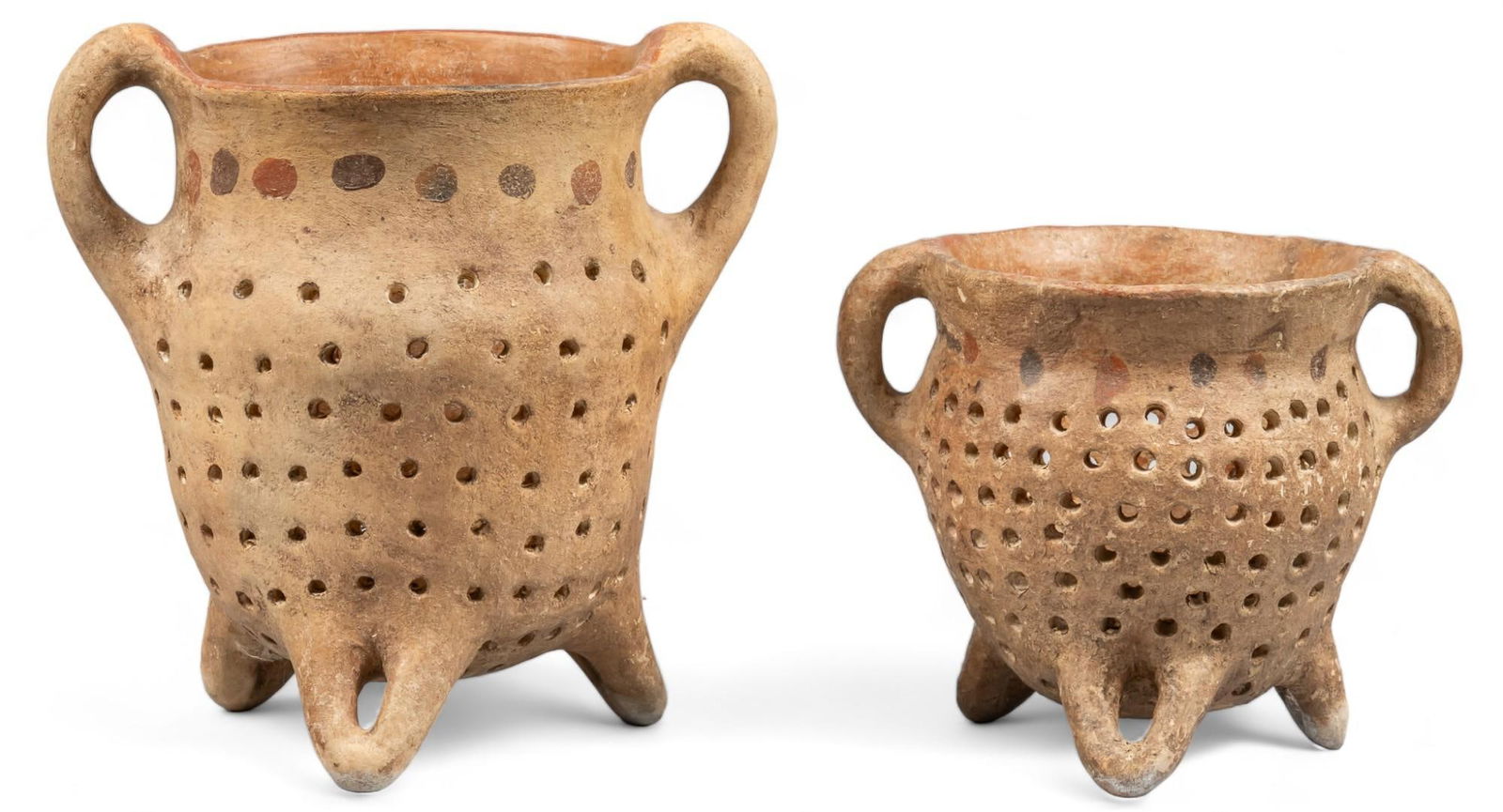 Pair of Ceramic Pinchancha Ollas: Pair of ceramic pichancha (water valve) ollas, of red clay, on tripod feet, with perforated design height 11.25 in. x width 11.5 in. x depth 7 in. / largest Shipping available for this lot through