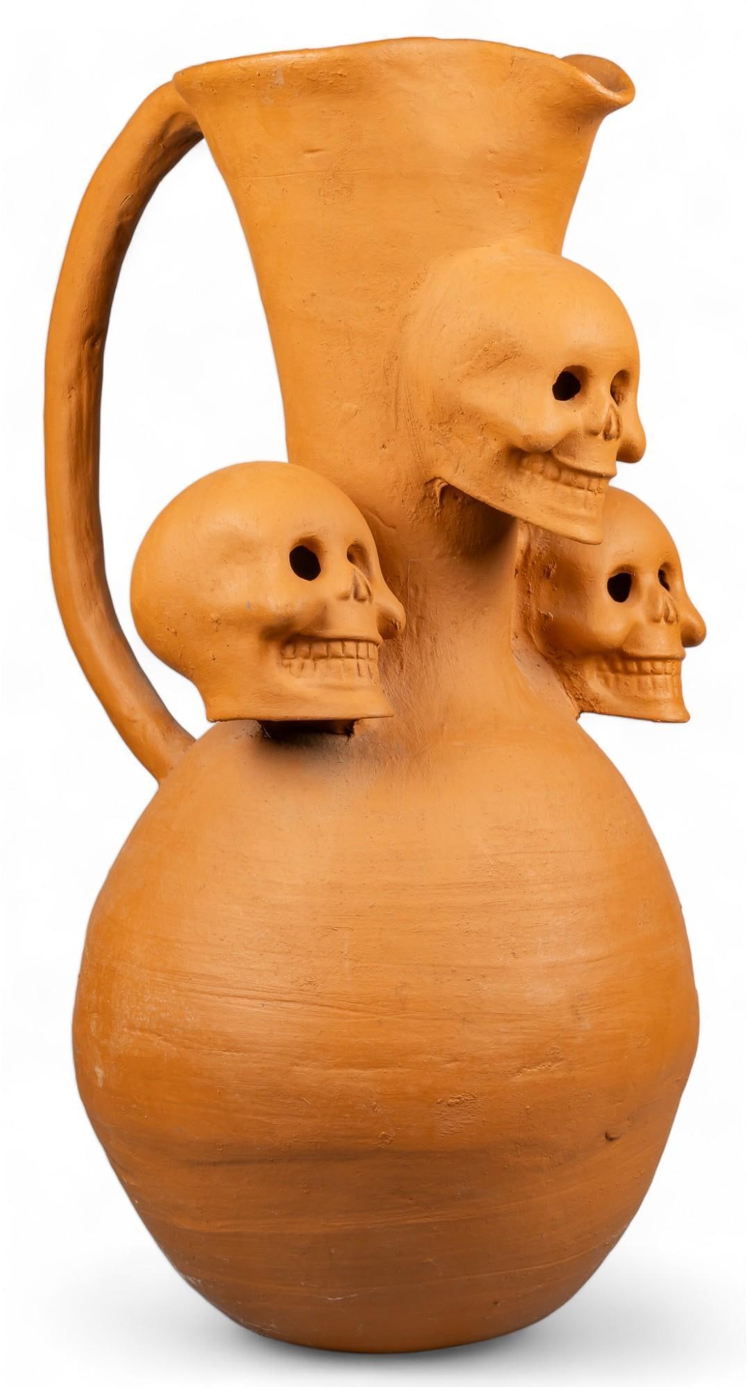 Alfonso Soteno Fernandez, Day of the Dead Jarro: Alfonso Soteno Fernandez (Metepec, State of Mexico), large Day of the Dead jarro, with three large calaveras, modeled and molded terracotta, unglazed, signed on side height 36 in. x width 18 in. x dep