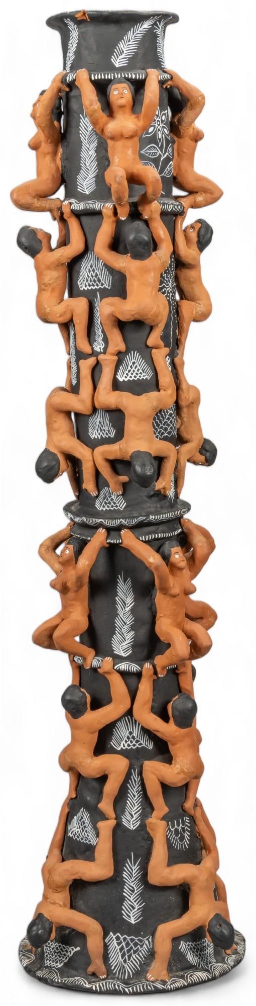 Tomasa Gonzalez Sanchez, Tall Black Ocumichi Candlestick: Tomasa Gonzalez Sanchez, tall black Ocumichu candlestick with many nude figures climbing object, white painted patterns throughout, signed on front height 42 in. x width 11 in. x depth 11 in. Condi