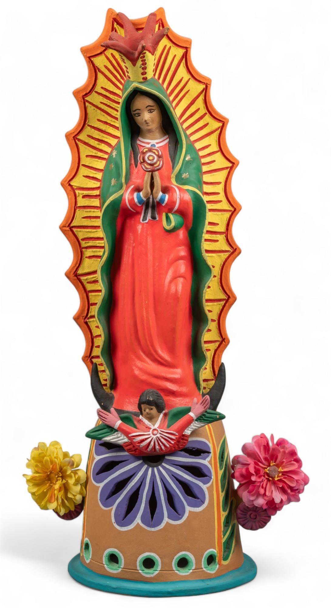 Virgen de Guadalupe, Ceramic Candelabra: Large Mexican modeled and painted ceramic candelabra depicting La Virgen de Guadalupe, with faux floral accents height 27 in. x width 13.5 in. x depth 9.5 in. Shipping available for this lot through o