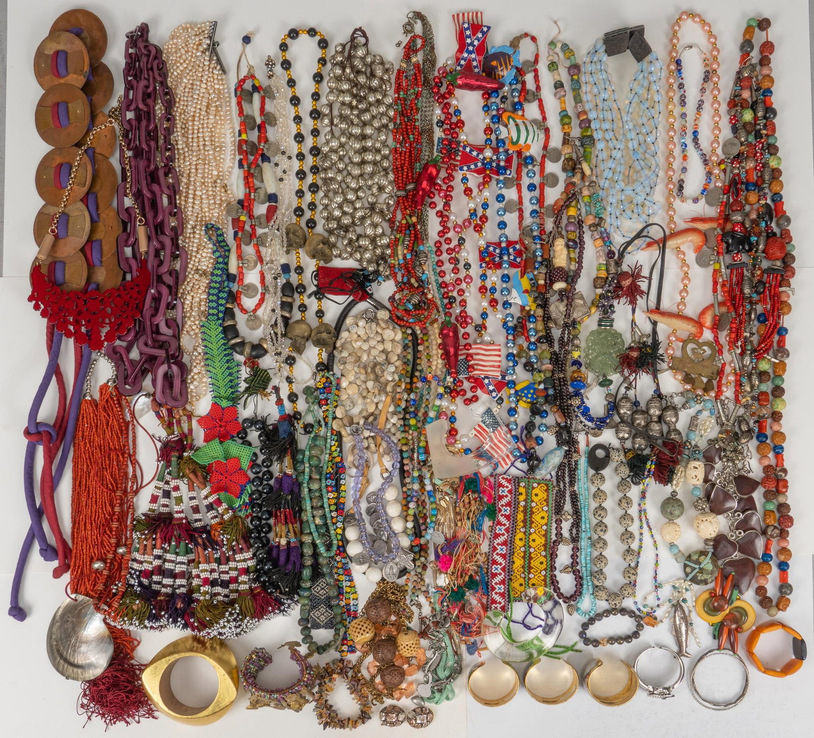 Large Collection of Costume Jewelry: Large collection of colorful costume jewelry, approximately 50 pieces, includes necklaces and bracelets Shipping available for this lot through our partner 4CL; please request a shipping quote at ship