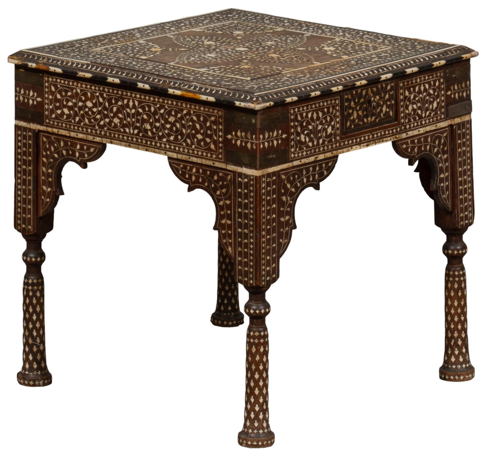 Mexican Bone Inlaid Side Table: Vintage Mexican wooden side table, featuring intricate bone inlay throughout, with carved details, supported on turned legs height 19 in. x width 18 in. x depth 18 in. Shipping available for this lot 