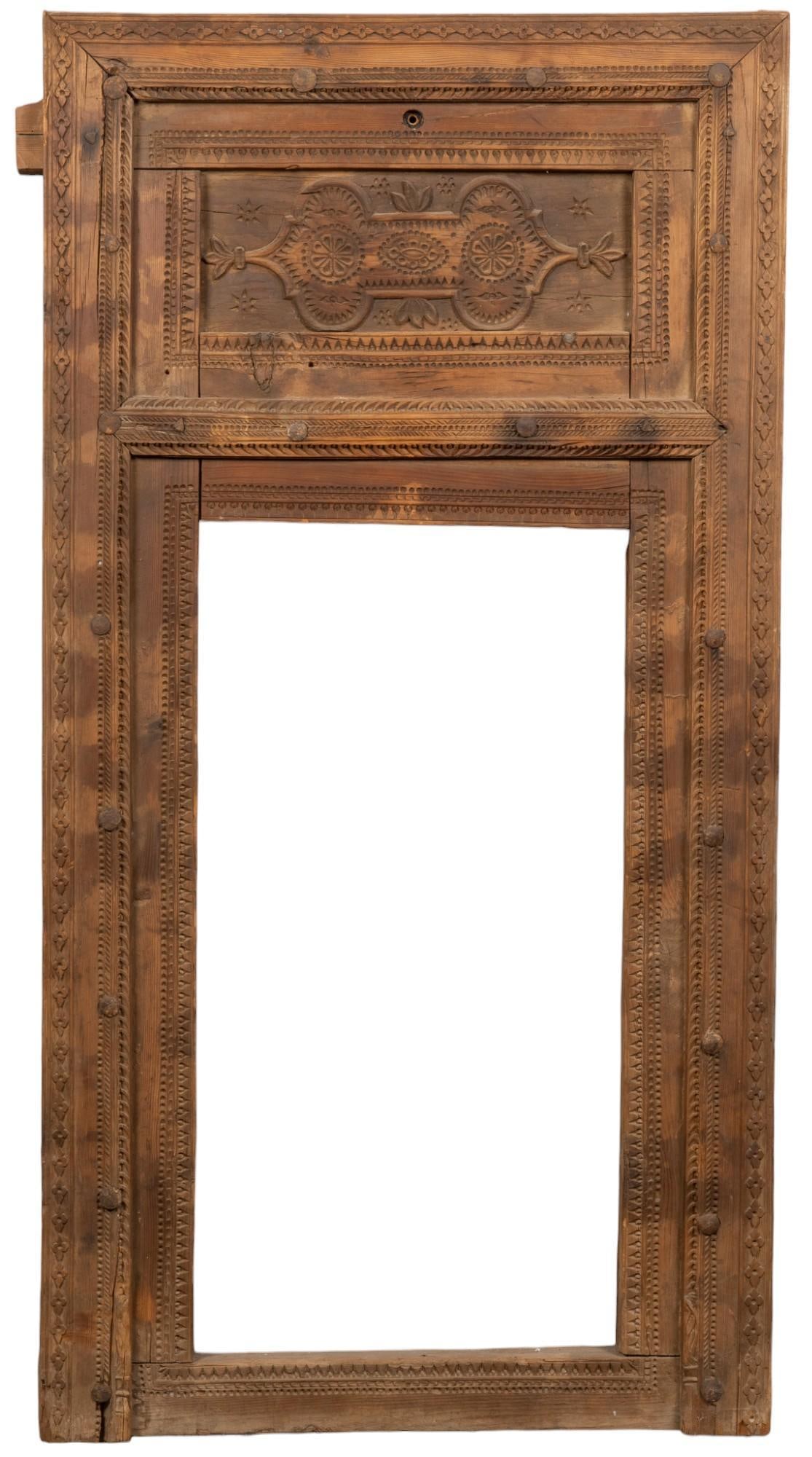 Indian Style Carved Wood Door Frame: Indian style carved wood door frame featuring carved border with central open space for door or window height 31.5 in. x width 83 in. x depth 83 in. Shipping available for this lot through our partner