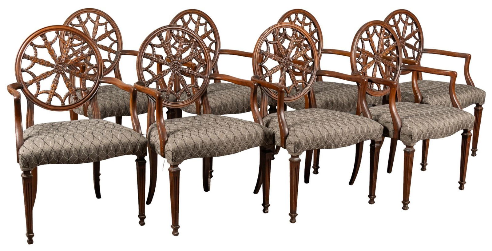 (8) Dining Chairs: Set of eight dining chairs, featuring shaped and carved circular backrest, cushioned seats with fabric upholstery, on tapering wooden legs with fluted design height 39.5 in. x width 29 in. x depth 21