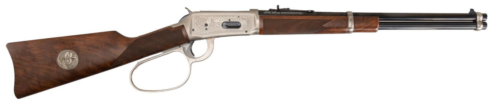 Nice Winchester Model 94 John Wayne Commemorative Carbine: Serial: JW 34682 Manufacturer: Winchester (c. 1981) Model: 94 John Wayne Commemorative Caliber: 32-20 Barrel length: 18 in. OAL: 36.5 in. (box: 40.5 x 7 x 3 in.) Condition: Very Good; light wear marks
