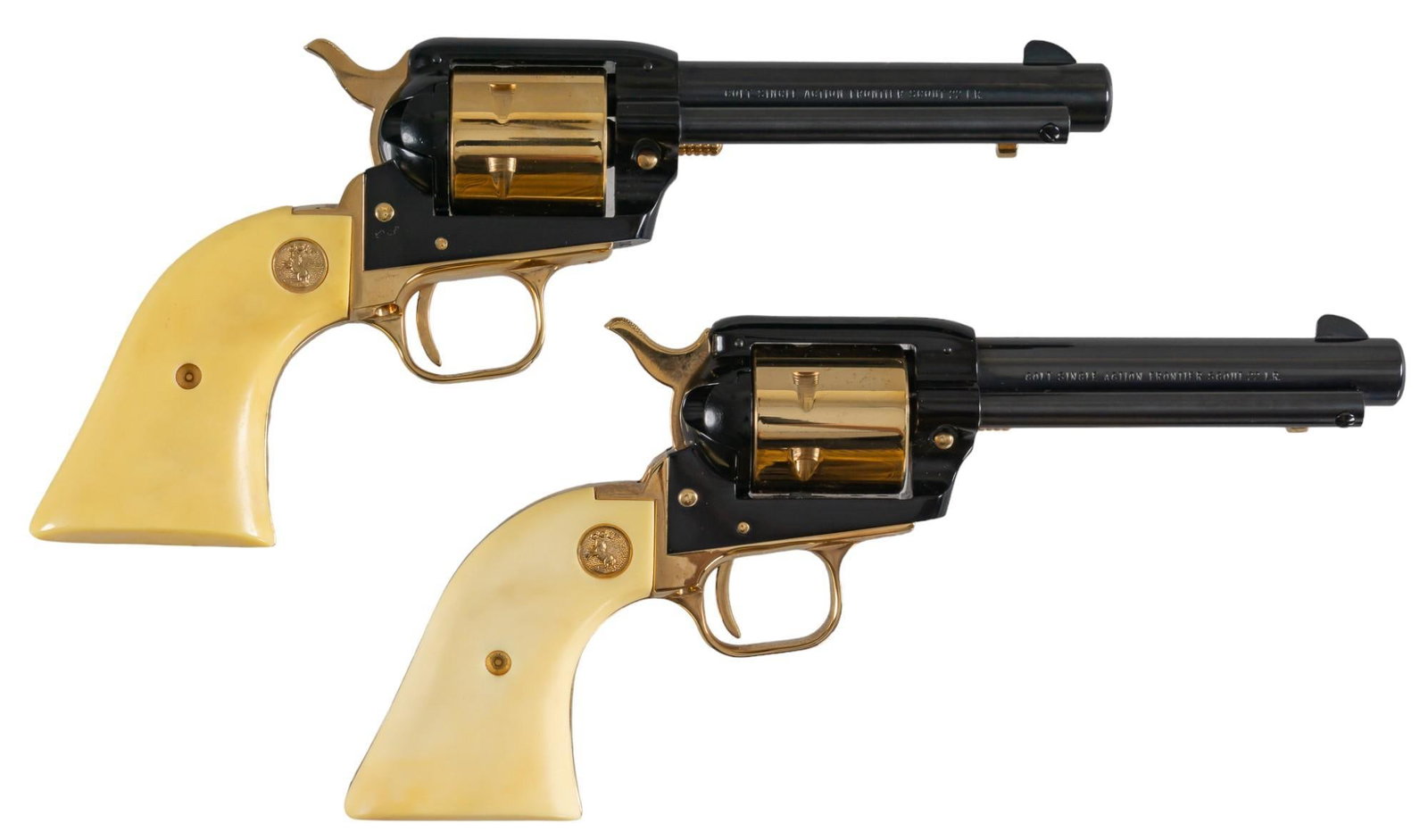 Pair of Cased Colt 1967 Alamo Scout 22LR Revolvers: Serial: (1) 72A22; (2) 1212A22 Manufacturer: Colt's PT. F.A. Mfg. Co. (c. 1967) Model: Alamo Scout Caliber: 22LR Barrel length: 4.5 in. OAL: 10 in. Condition: Excellent-Like New in Box; ivorex gri