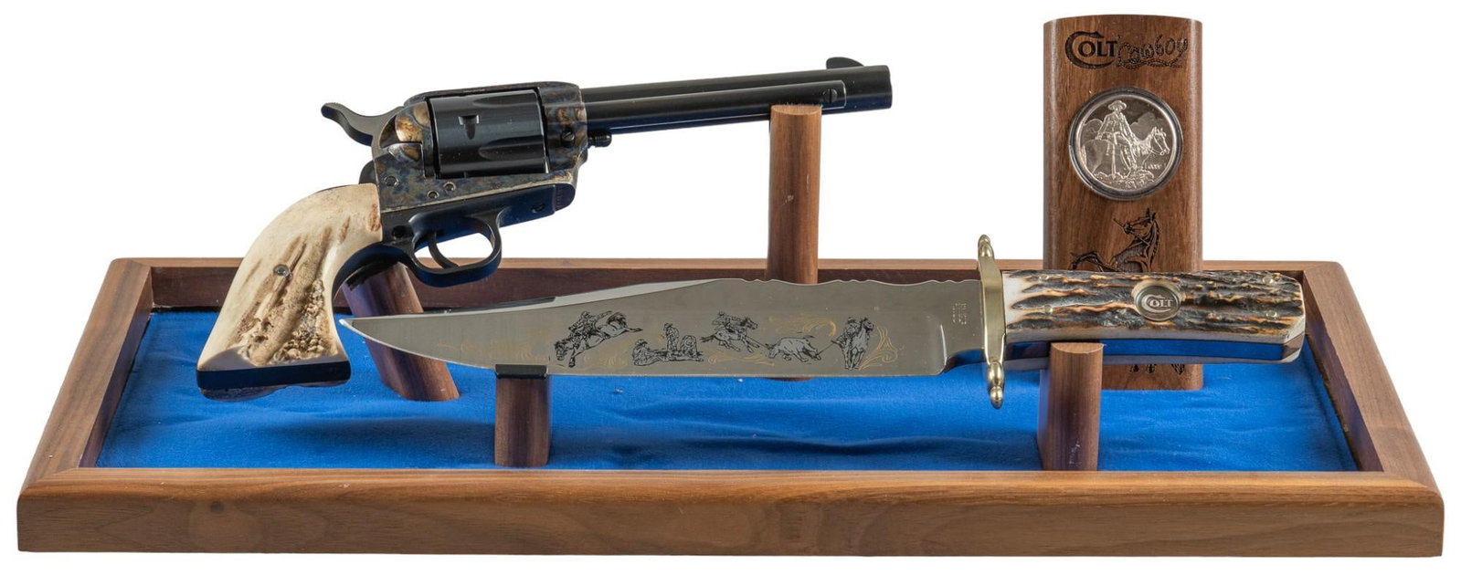 Sought After Colt Cowboy SAA Collection Revolver Knife Coin Set #59: Serial: TF00059 Manufacturer: Colt's PT. F.A. Mfg. Co. (c. 1998) Model: Cowboy SAA Collection Set (#59 of 2,000)(1 of 1,000 w/ display set) Caliber: 45 Colt Barrel length: 5.5 in. OAL: 11 in. (cas
