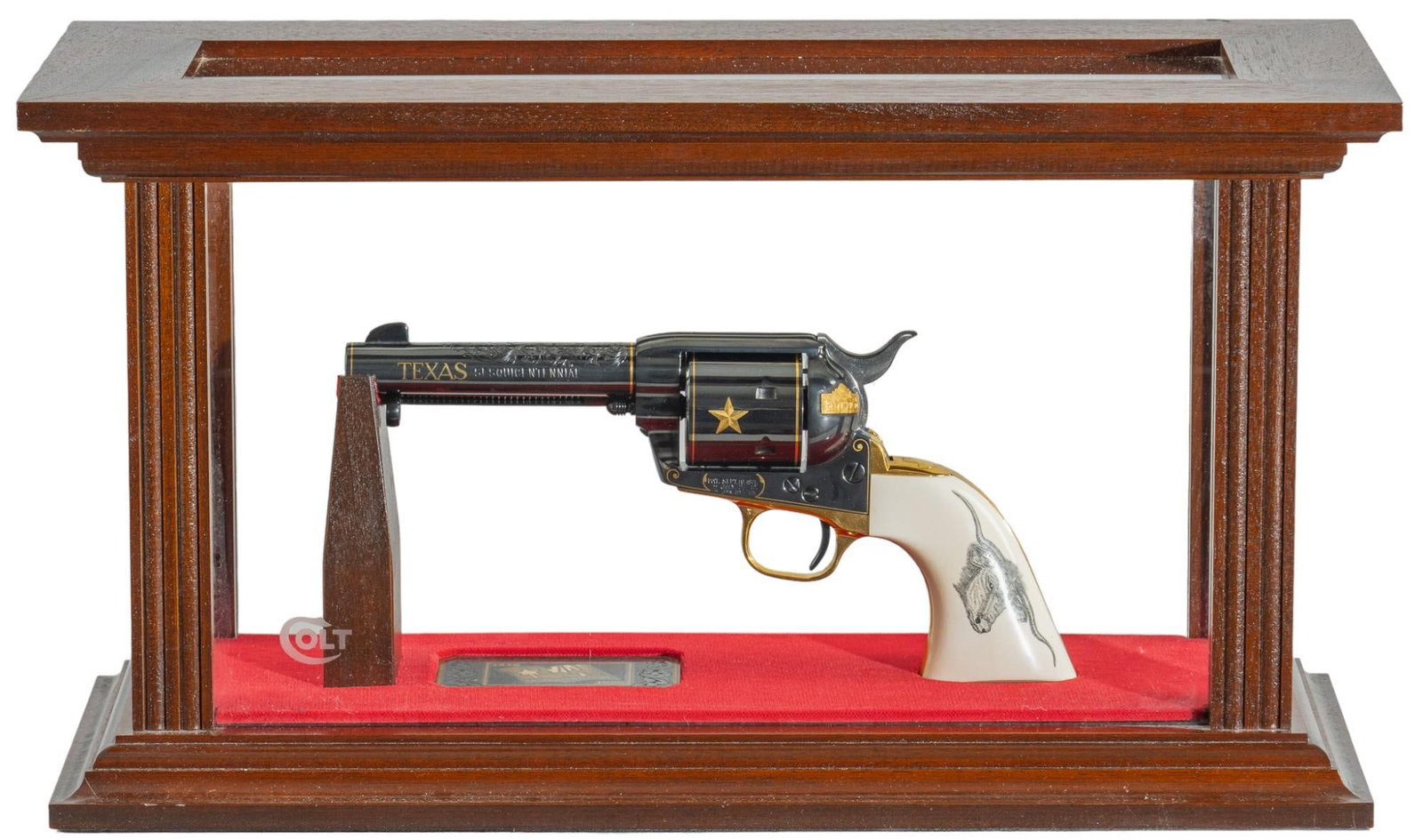 Ultra Rare Colt SAA Texas Sesquicentennial Premier Commemorative #54 of 75: Serial: TEXAS 54 Manufacturer: Colt's PT. F.A. Mfg. Co. (c. 1985) Model: SAA Texas Sesquicentennial Premier (#54 of 75) Caliber: 45 Colt Barrel length: 4.75 in. OAL: 10.5 in. (glass display: 18.5 