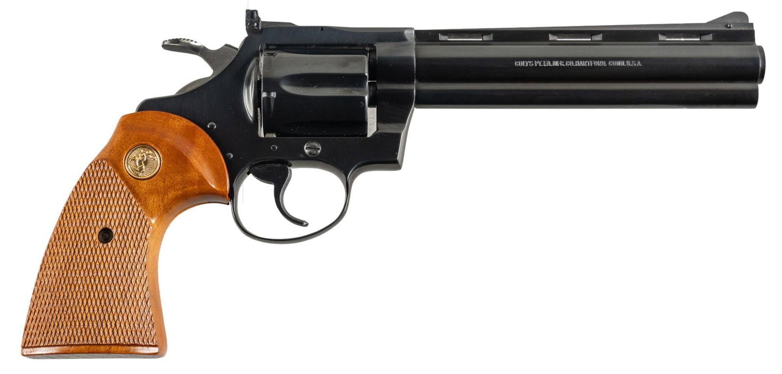 Colt Diamondback 38SPL Revolver: Serial: P04711 Manufacturer: Colt's PT. F.A. Mfg. Co. (c. 1981) Model: Diamondback Caliber: 38 Special Barrel length: 6 in. OAL: 10.5 in. Condition: Very Good; factory wood grips have very light w