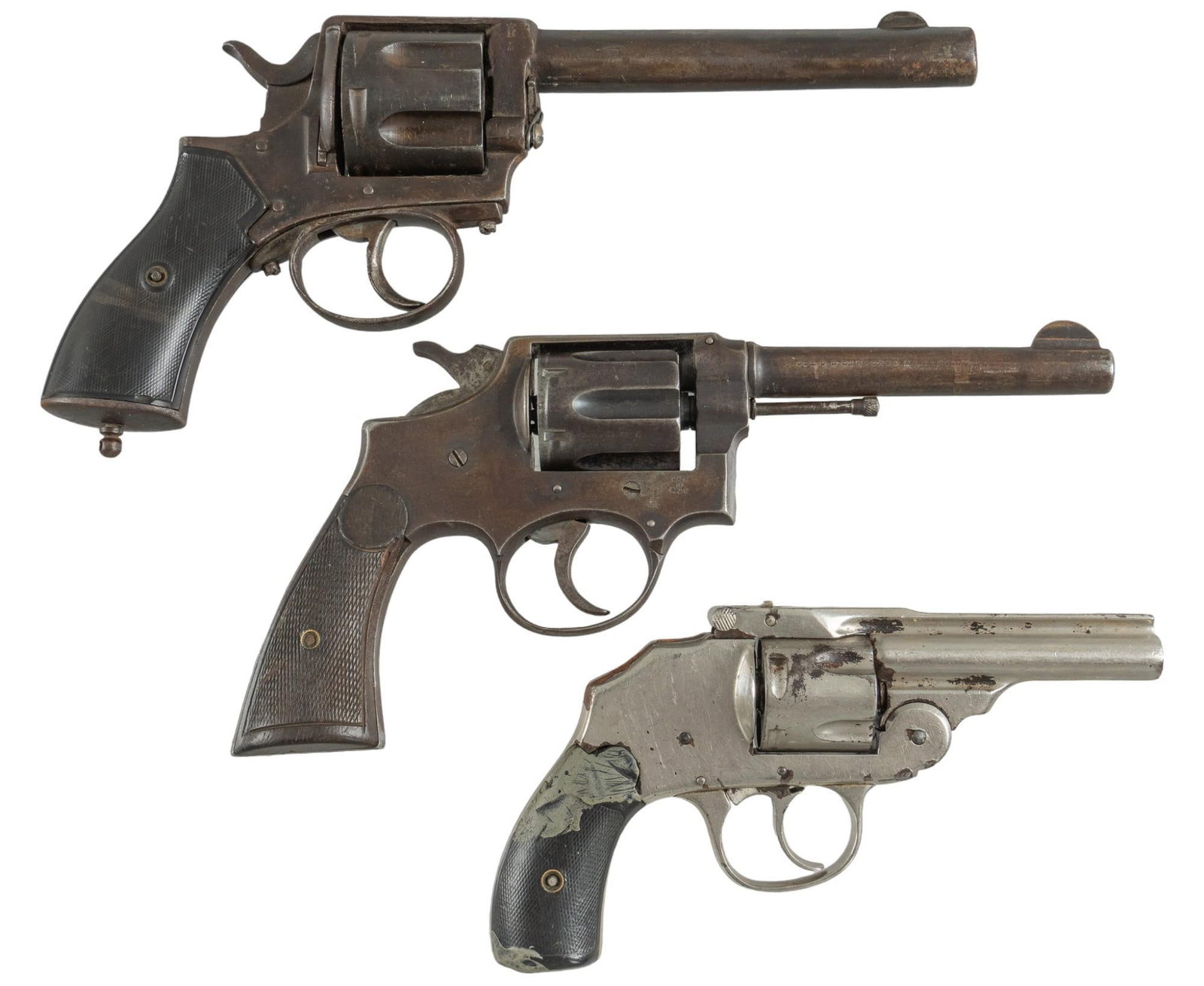Collection of 3 Revolvers: Serial: (1) 28711; (2) No Serial Number (3) 14905 Manufacturer: (1) U.S. Revolver Co.; (2) Liege Belgium; (3) Spain Model: (1) Top Break Hammerless; (2) Frontier Army; (3) Rural Caliber: (1) 38 S&