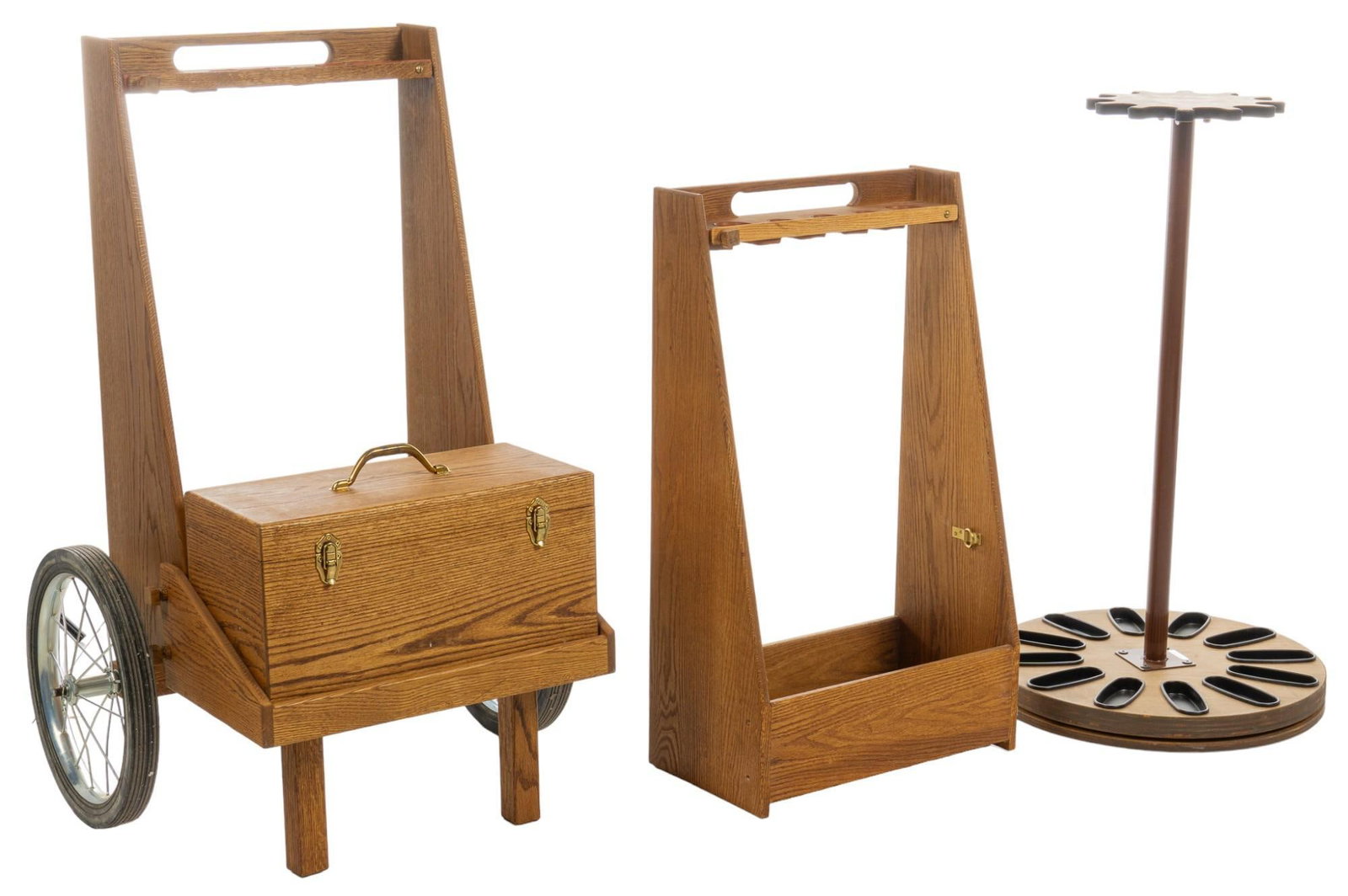 Set of 3 Gun Display Stands: Includes: - (1) five slot display stand - (1) twelve slot rotating display stand - (1) five slot range cart Condition: light wear on edges Provenance: Property from the monumental lifetime collection 