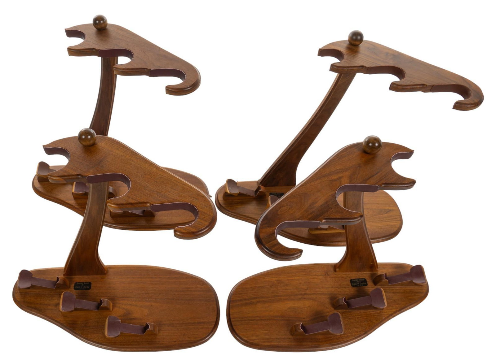 4 Karl H. Dede Gun Display Racks: Includes: -(4) long gun display stands by Karl H. Dede; three slots Condition: light wear from storage Provenance: Property from the monumental lifetime collection of a distinguished Dallas, Texas bus