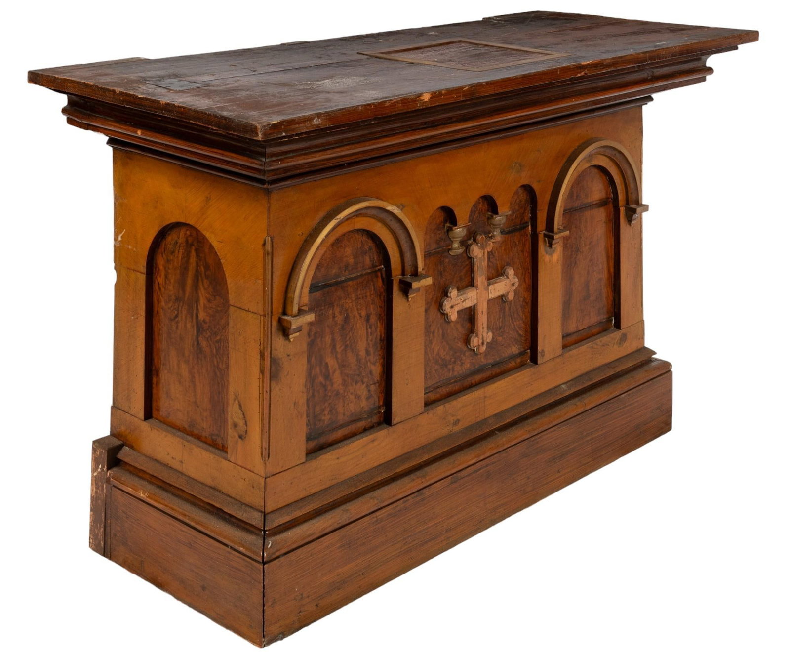 Religious Podium: Wooden religious podium / altar, featuring oversize top with crown molding over Gothic style motifs, with cross motif height 38.5 in. x width 66.5 in. x depth 26.5 in. Shipping available for this lot 