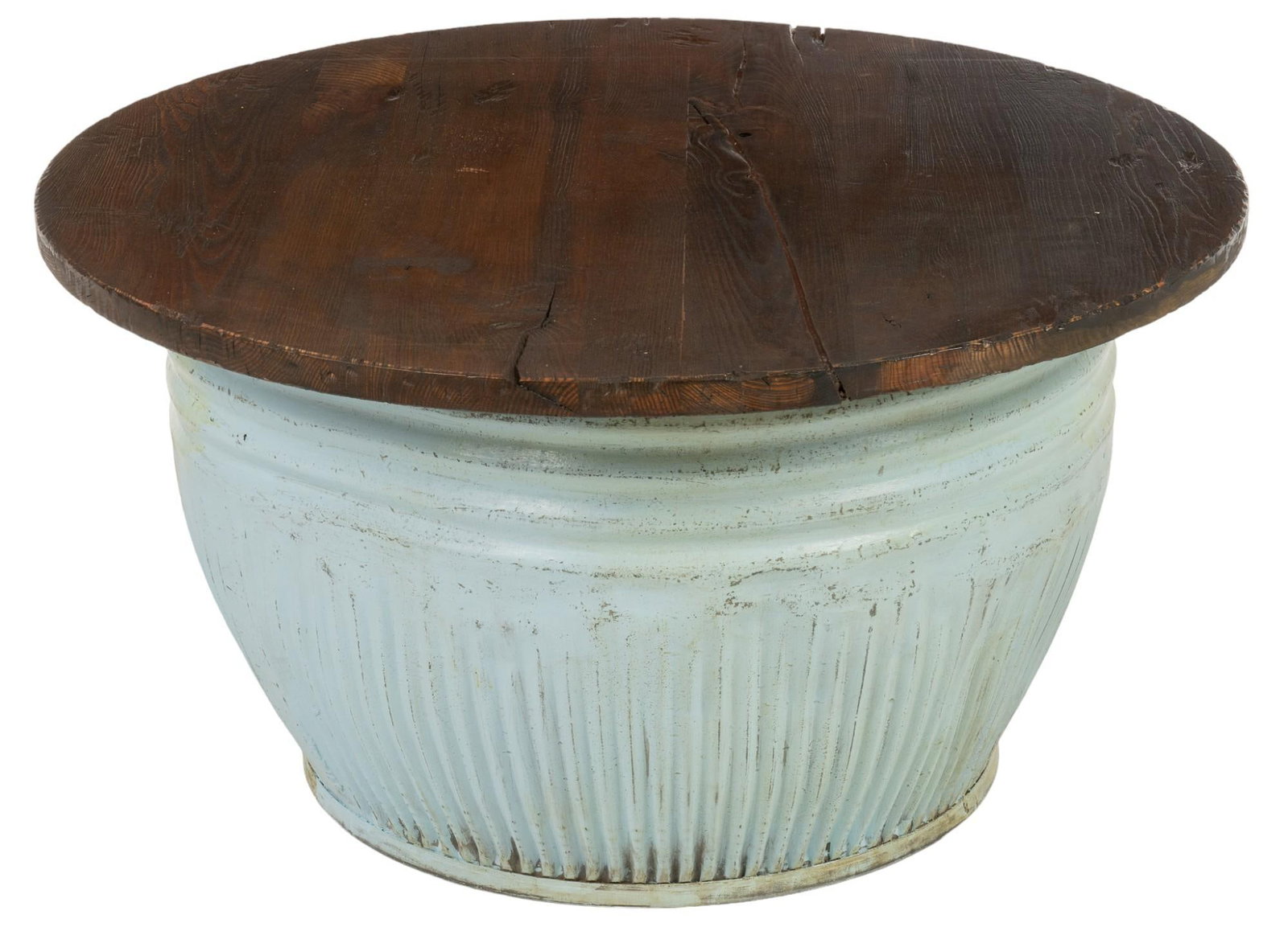 Rustic Table: Vintage table featuring finished circular wooden top supported on hollow metal urn base with fluted design height 21 in. x width 39 in. x depth 39 in. Shipping available for this lot through our partn