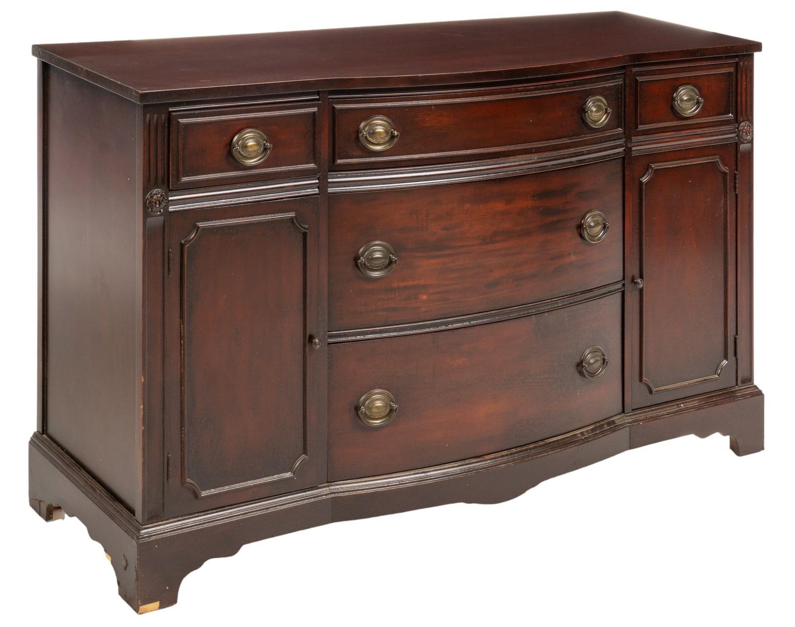 Wooden Dresser: Wooden dresser, having central stack of three drawers with metal pulls, flanked by a small drawer over cabinet door opening to interior storage height 35 in. x width 59 in. x depth 20 in. Provenance: 