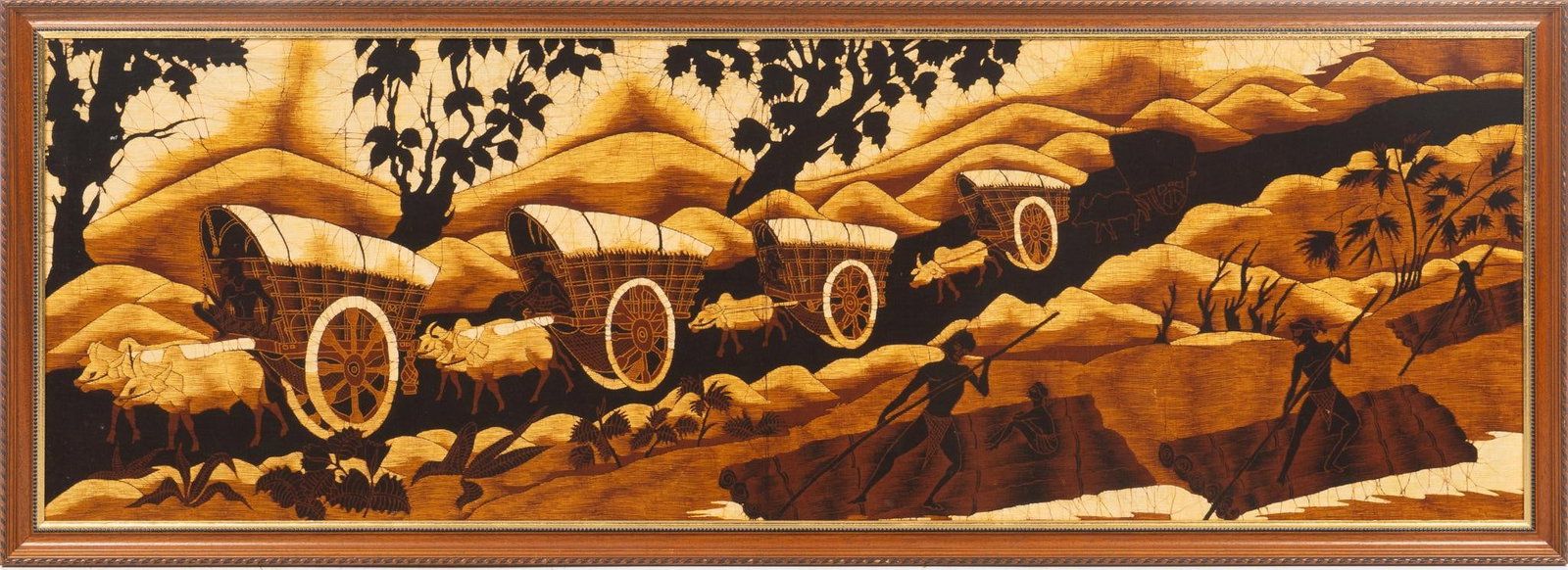 Pyrography Folk Art: Framed pyrography folk art featuring primitive pastoral scenes with farming figures and covered wagons pulled by livestock height 30.5 in. x width 81.5 in. Shipping available for this lot through our 