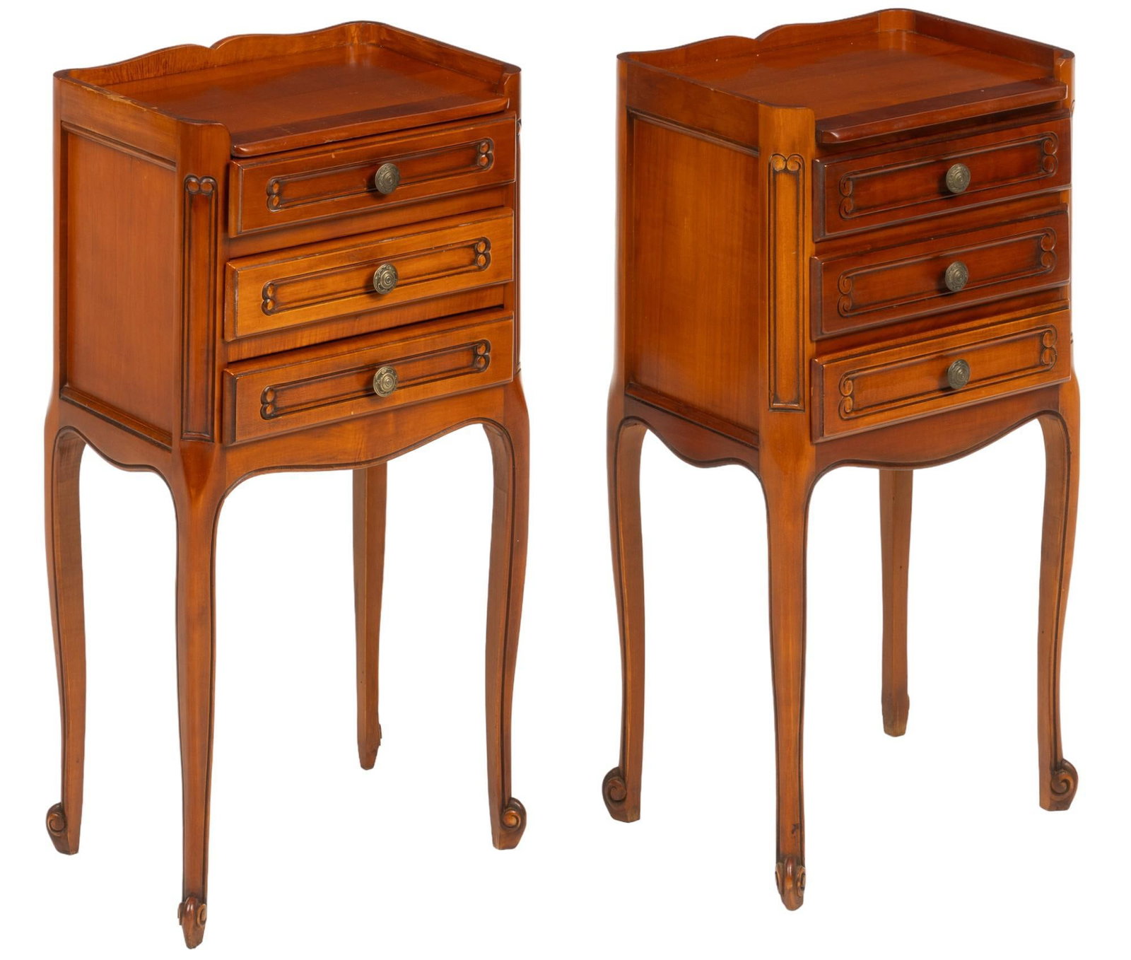 Pair of Louis XV Style Nightstands: Pair of Louis XV style nightstands, with serpentine gallery over stack of three drawers with carved detail, and wooden pulls, supported on cabriole legs height 27 in. x width 14.5 in. x depth 11 in. S