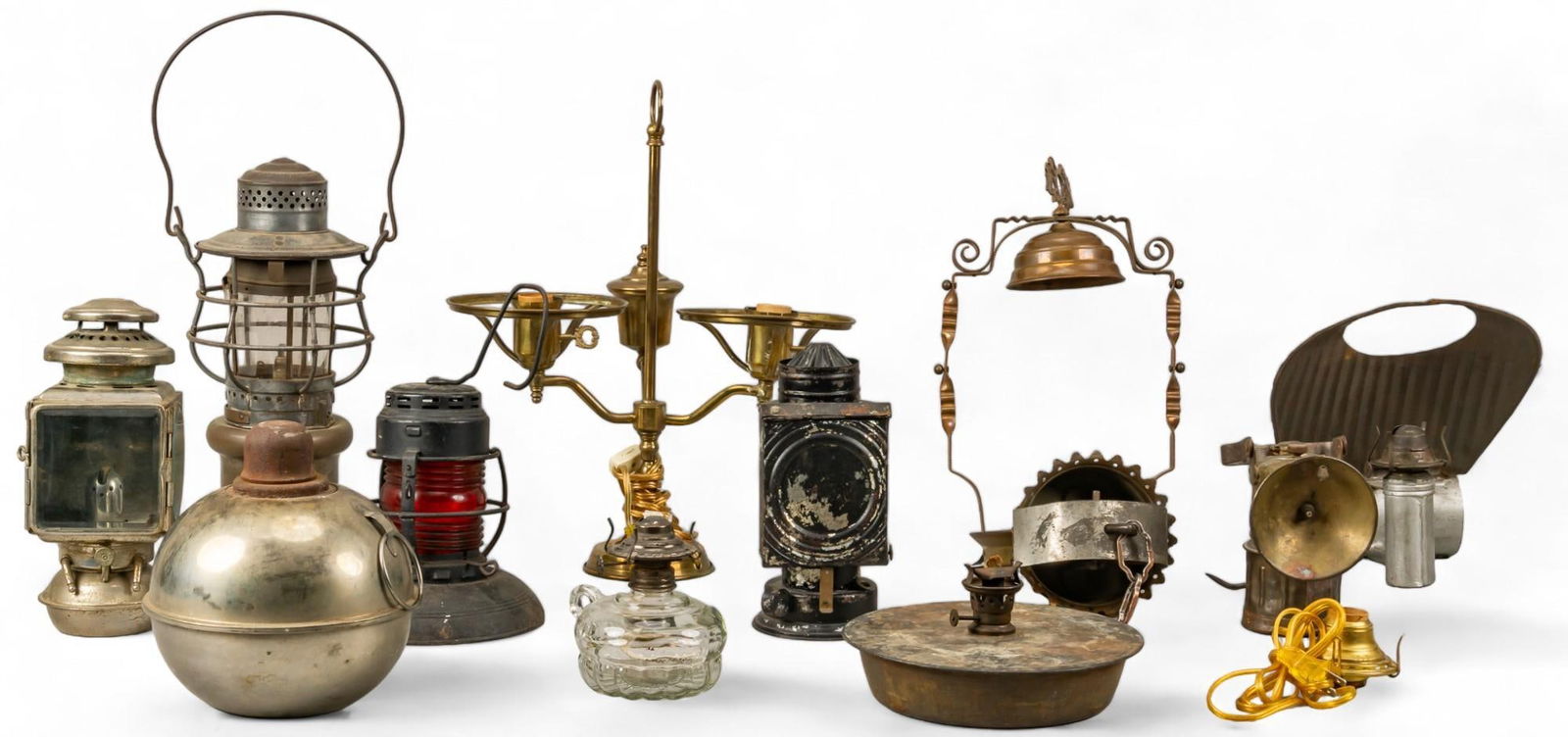 Collection of Vintage Lanterns: Collection of miscellaneous lanterns and beacons, including nautical and railroad examples height 10.25 in. x width 7.5 in. x depth 5.5 in. / largest Shipping available for this lot through our par