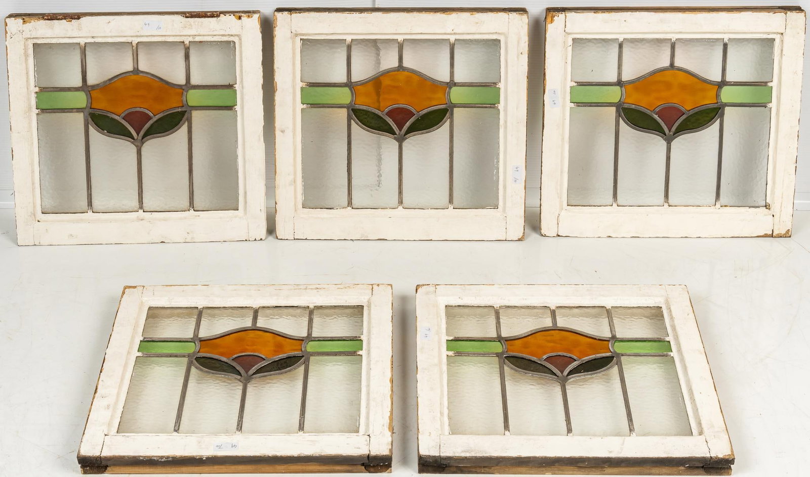 Set of (5) Stained Glass Panels: Set of five stained glass panels, in wood frame height 19 in. x width 18 in. x depth 1.5 in. Shipping available for this lot through our partner 4CL; please request a shipping quote at shipping@vo