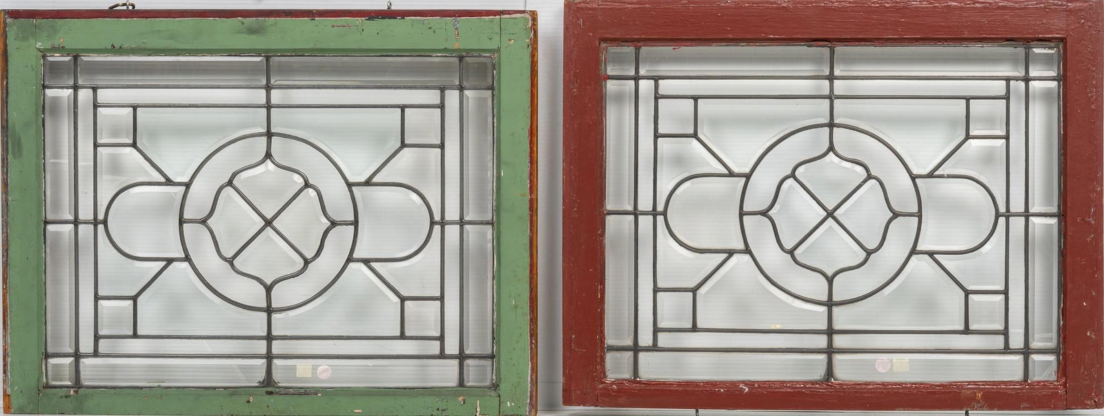 Pair of Leaded Glass Panels: Pair of leaded glass panels with beveled edges, in wooden frames height 28 in. x width 22 in. x depth 1.5 in. Shipping available for this lot through our partner 4CL; please request a shipping quote a