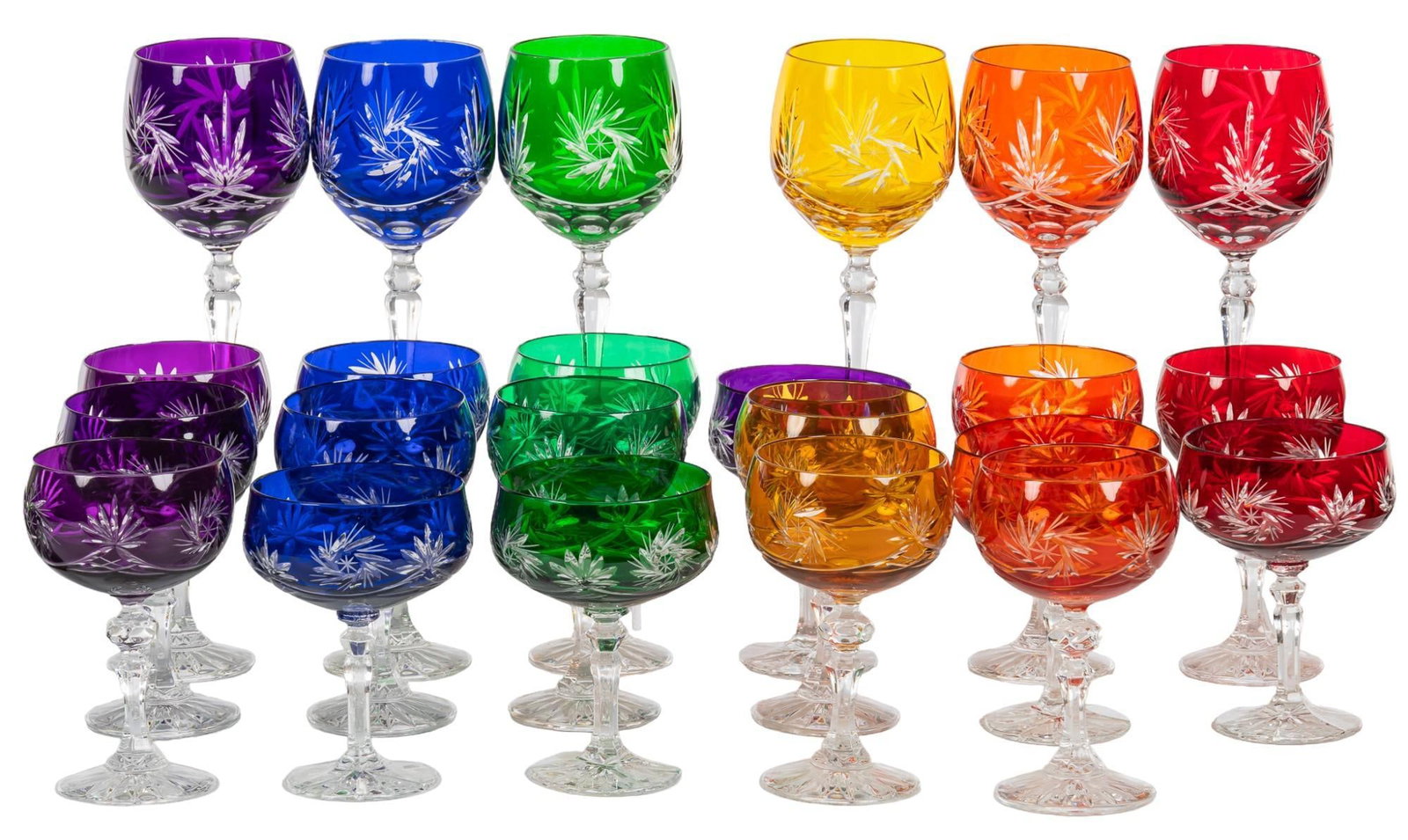 Collection of (23) Cut-To-Clear Glassware: Collection of twenty-three pieces of cut-to-clear glassware, includes six wine glasses, and seventeen champagne glasses, in assorted colors height 8 in. diameter 4 in. / each wine glass Shipping avail