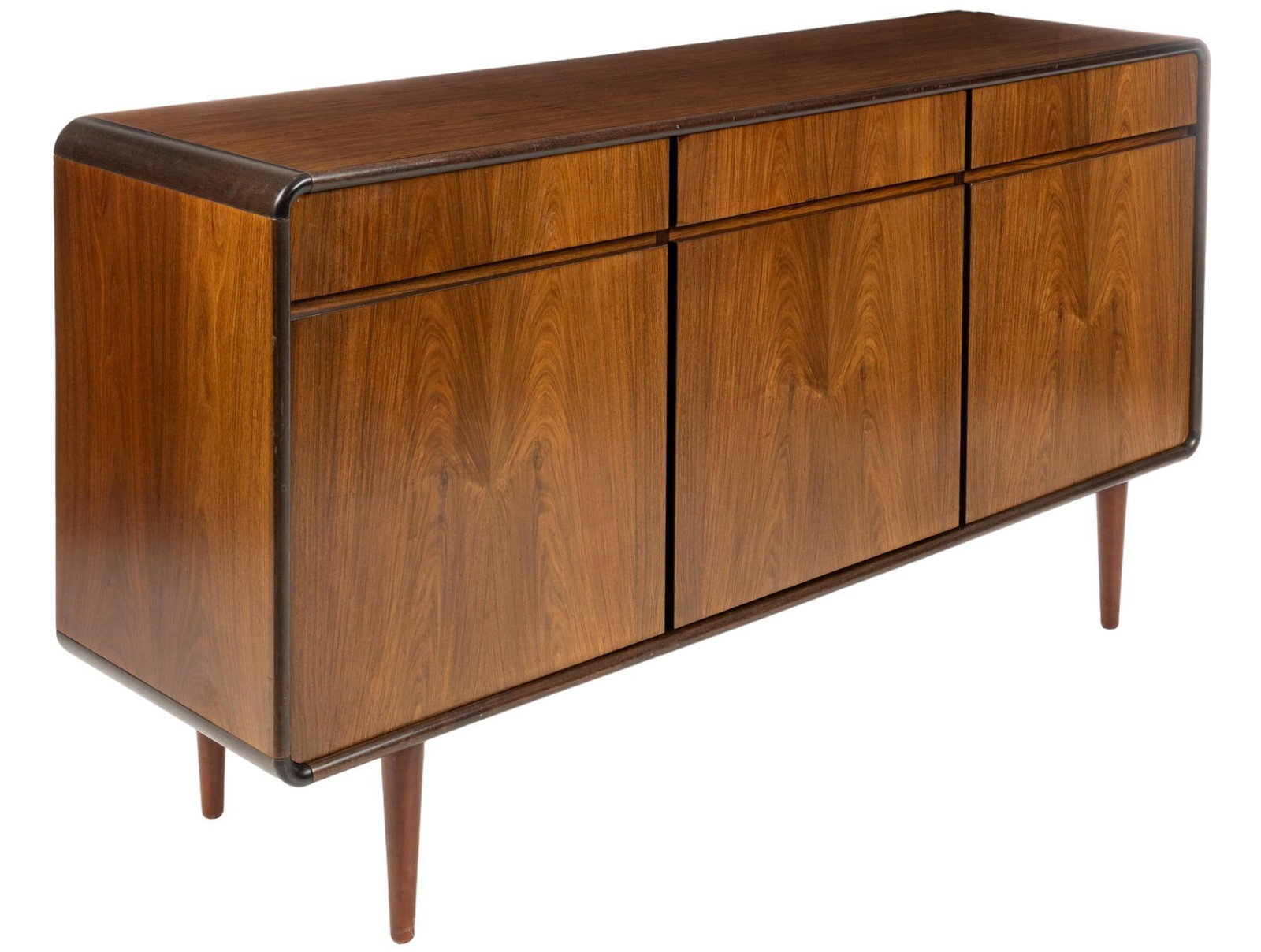 Danish Mid-Century Sideboard: Danish mid-century sideboard, featuring three doors opening to shelved interior storage below three drawers, supported on tapered legs height 37.5 in. x width 71 in. x depth 19.5 in. Shipping availabl