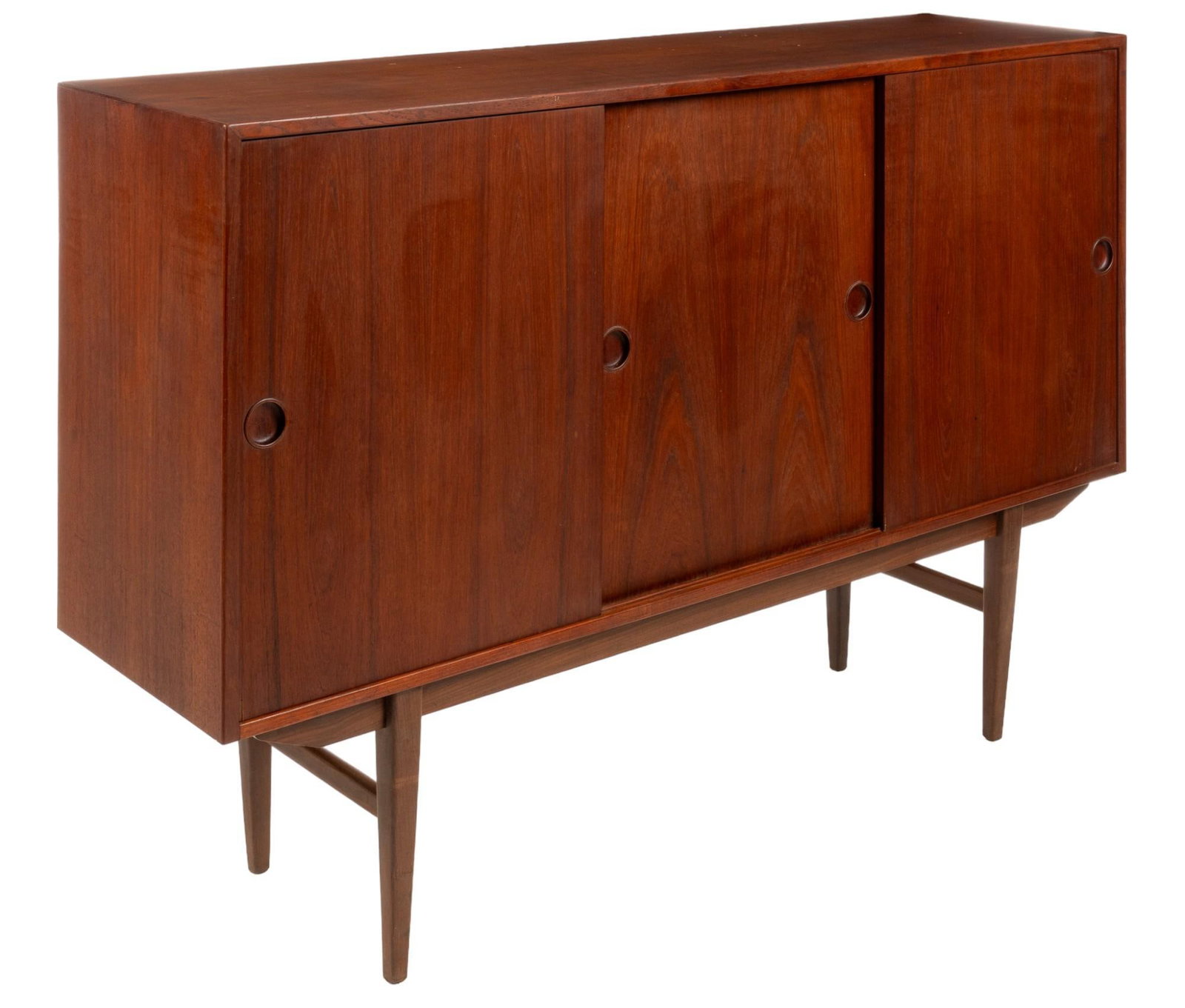 Danish Mid-Century Credenza: Danish mid-century credenza featuring three sliding doors with integrated wood pulls, two cabinets with three interior shelves, one side cabinet with four drawers, on pin legs height 42 in. x depth 65
