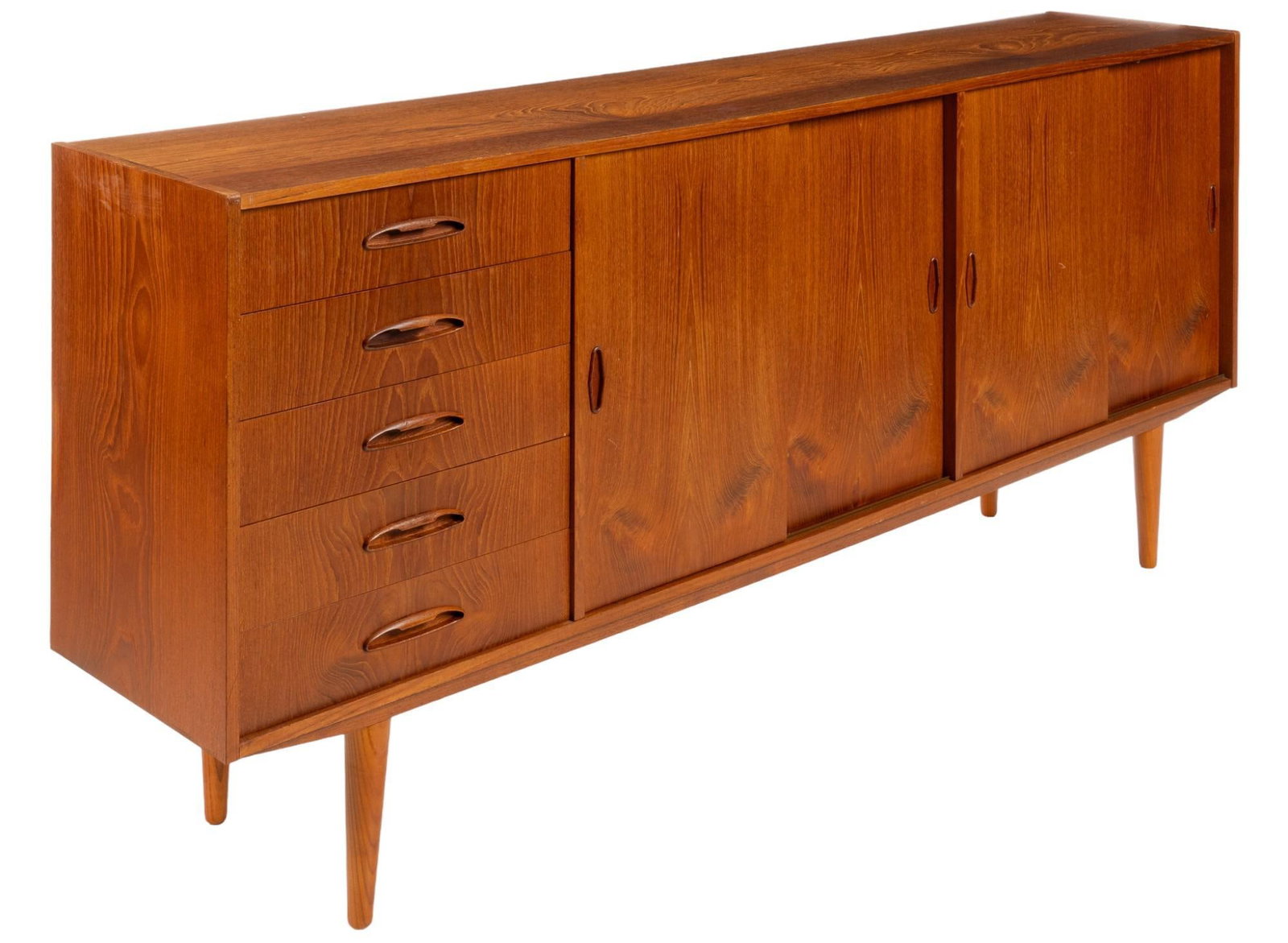Danish Mid-Century Teak Sideboard: Danish mid-century teak sideboard, with five drawers, and four sliding doors opening to storage with an interior shelf, on tapered legs height 35 in. x width 78.5 in. x depth 16 in. Shipping available