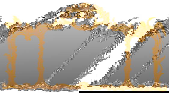 Italian Rococo Style Mirror: Italian Rococo style gilt wood mirror featuring intricate scrollwork with two bird / phoenix motifs, wired for hanging height 32 in. x width 58 in. x depth 3.5 in. Shipping available for this