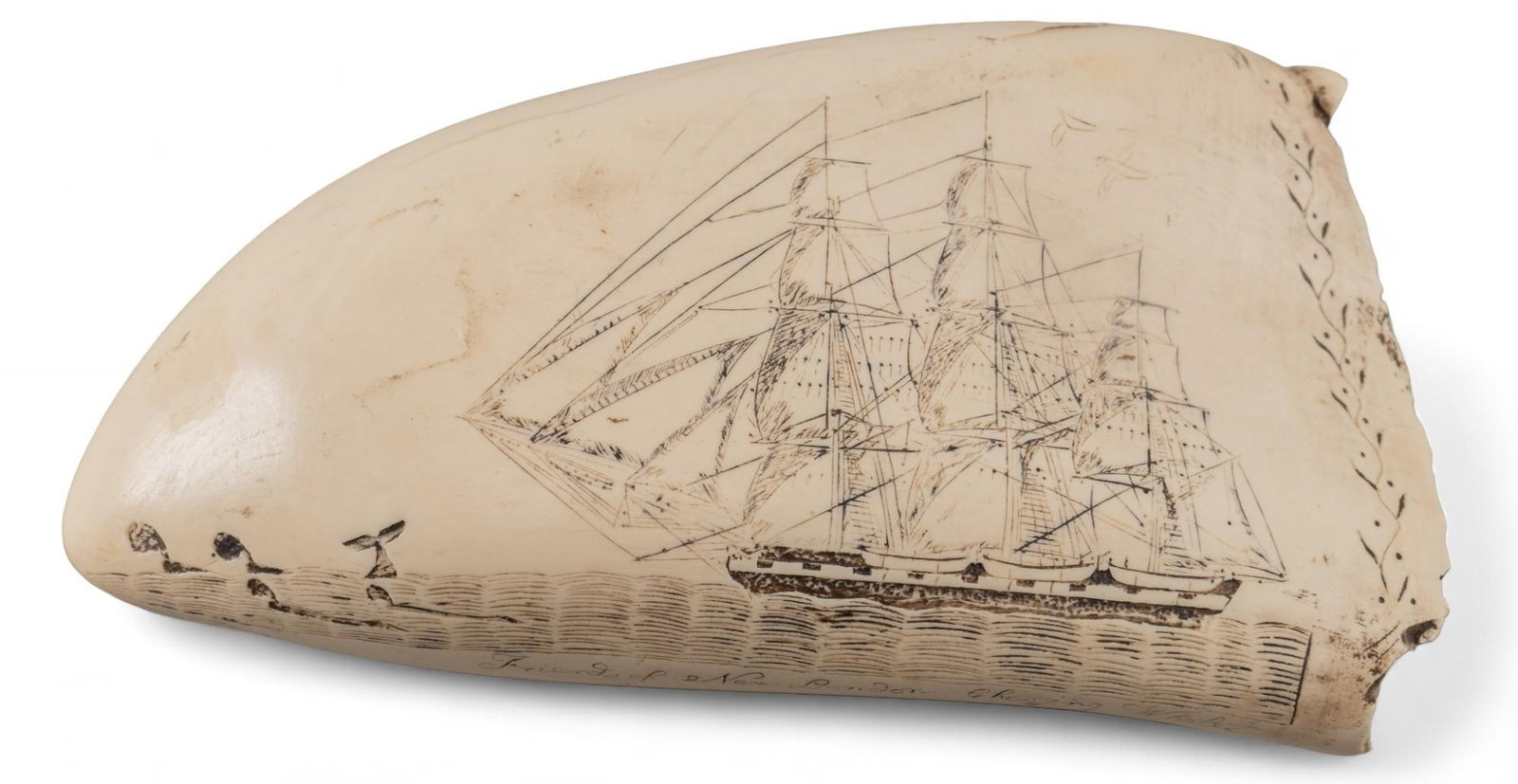 Scrimshaw Bone: Scrimshaw bone, featuring verso and recto ship illustrations, one with whales, reads "Friends of New London Chasing Whales" and "WM Tell of New York Cutting" height 5 in. x width 3 in.
