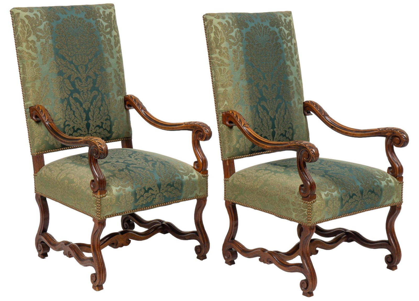 Pair of Louis XIV Armchairs: Pair of Louis XIV style armchairs featuring carved wooden frame featuring scrolled armrests with acanthus leaf motifs, with straight back and cushioned seat clad in green damask pattern fabric upholst