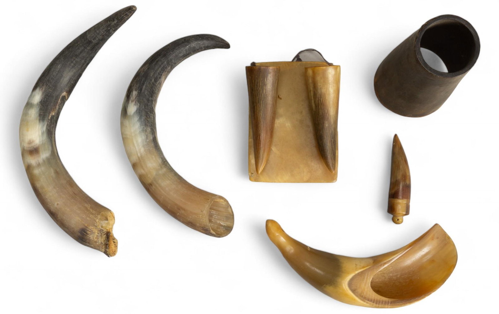 (6) Steerhorn Items: Collection of six miscellaneous steerhorn items height 8 in. x width 3.5 in. x depth 3.5 in. / largest Provenance: The collection of Mickey & Barbara Hunter, San Antonio, Texas Shipping available 
