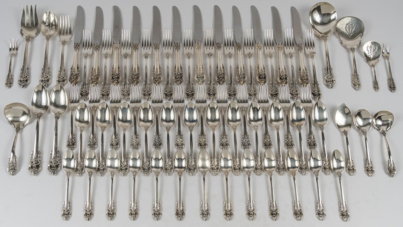 "Grand Baroque" by Wallace Silversmiths Sterling Silver Flatware: "Grand Baroque" by Wallace Silversmiths sterling silver flatware set of 73 pc, service for 12, no monogram or removable Includes: 12 dinner knives 9 ½ in. 12 dinner forks 7 3/4 in. 12 s