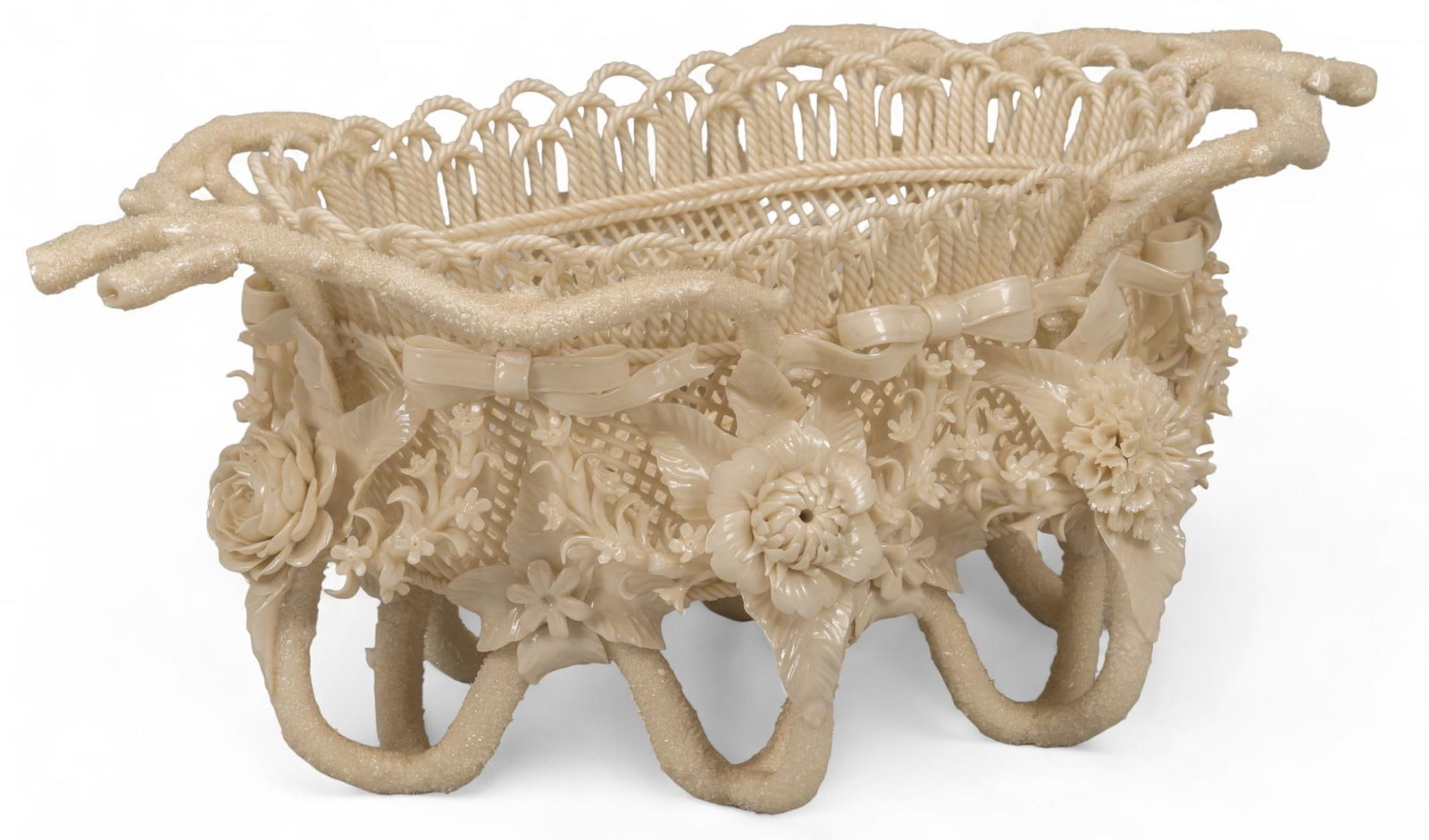 Belleek (Fermanagh, Ireland) Rathmore Porcelain Lattice Basket: Belleek (Fermanagh, Northern Ireland) Rathmore porcelain basket, featuring woven lattice design with coral handles and feet, decorated with porcelain flowers and bows, pearl glaze, marked "Belleek