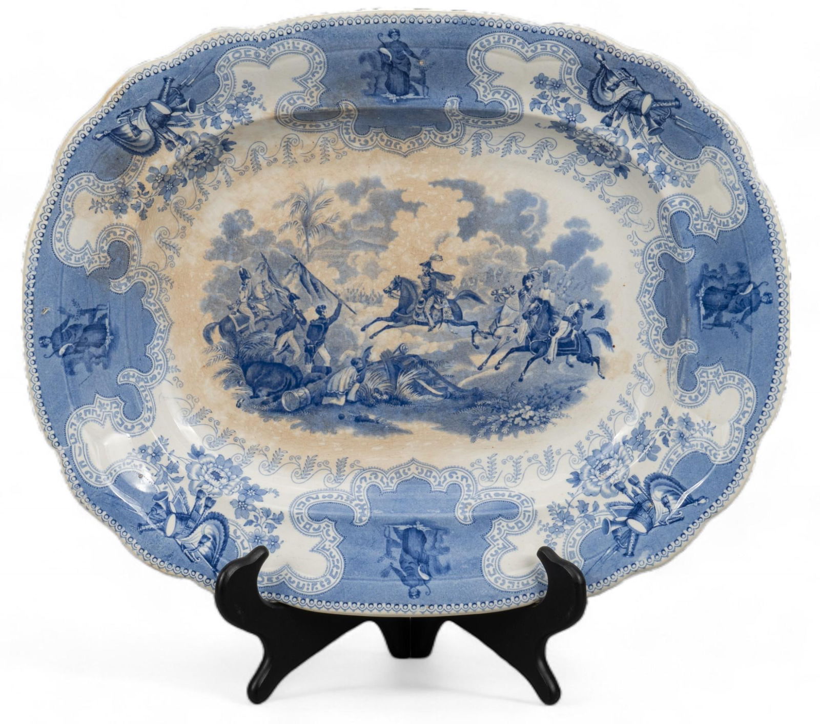 Staffordshire (ENG) Texian Campaigne Charger: Staffordshire (England) Texian Campaigne pattern ceramic charger, depicting the Battle of the Resaca de la Palme, blue transfer printed decoration, marked underfoot "J.B (James Beech)" with Te
