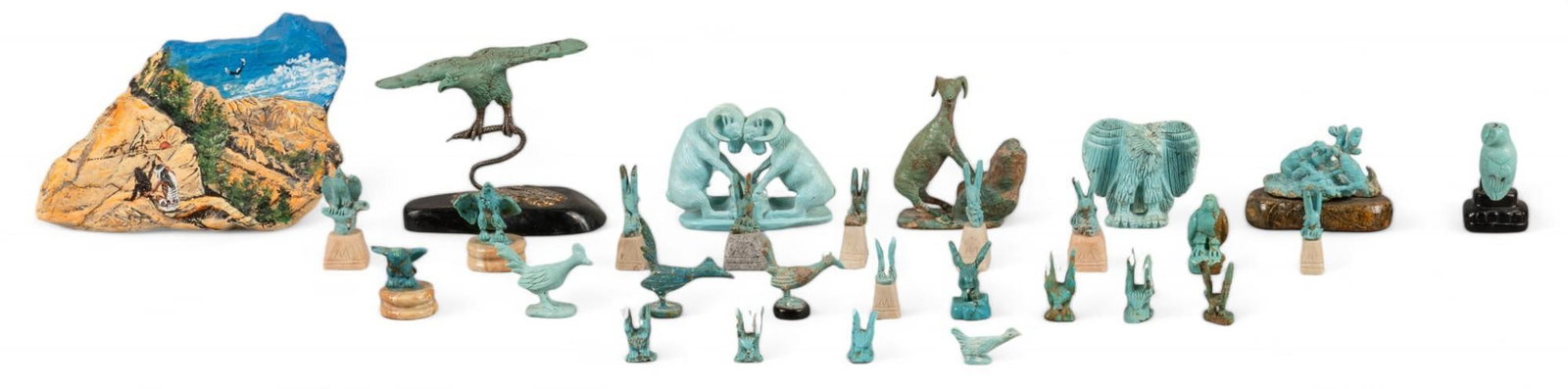 Collection of (29) Turquoise Figurines: Collection of twenty nine turquoise figurines includes birds, rams, and one hand painted stone height 4.25 in. x width 6.75 in. x depth 1.75 in. Shipping available for this lot through our partner 4CL